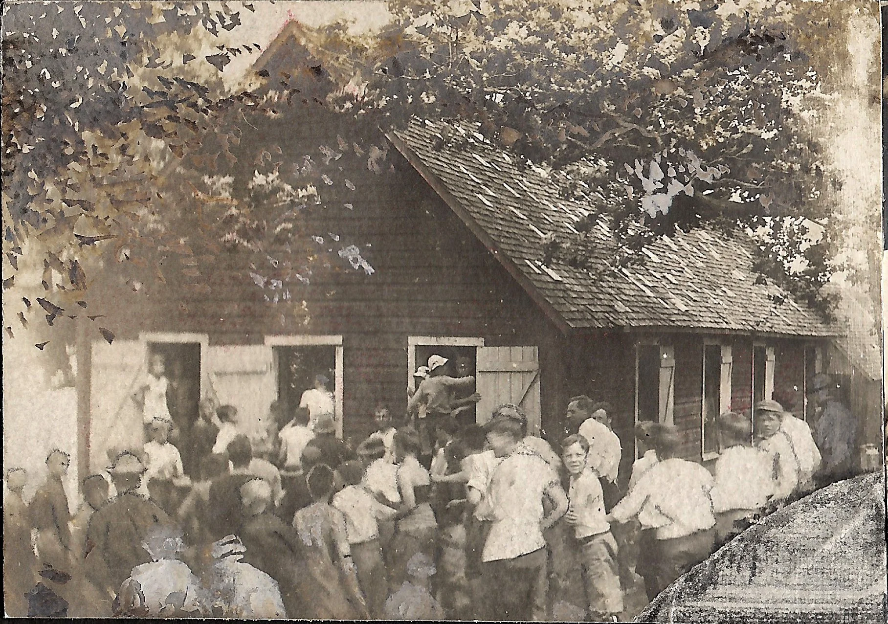1910s - Campers lined up outside the Dining Hall before a meal