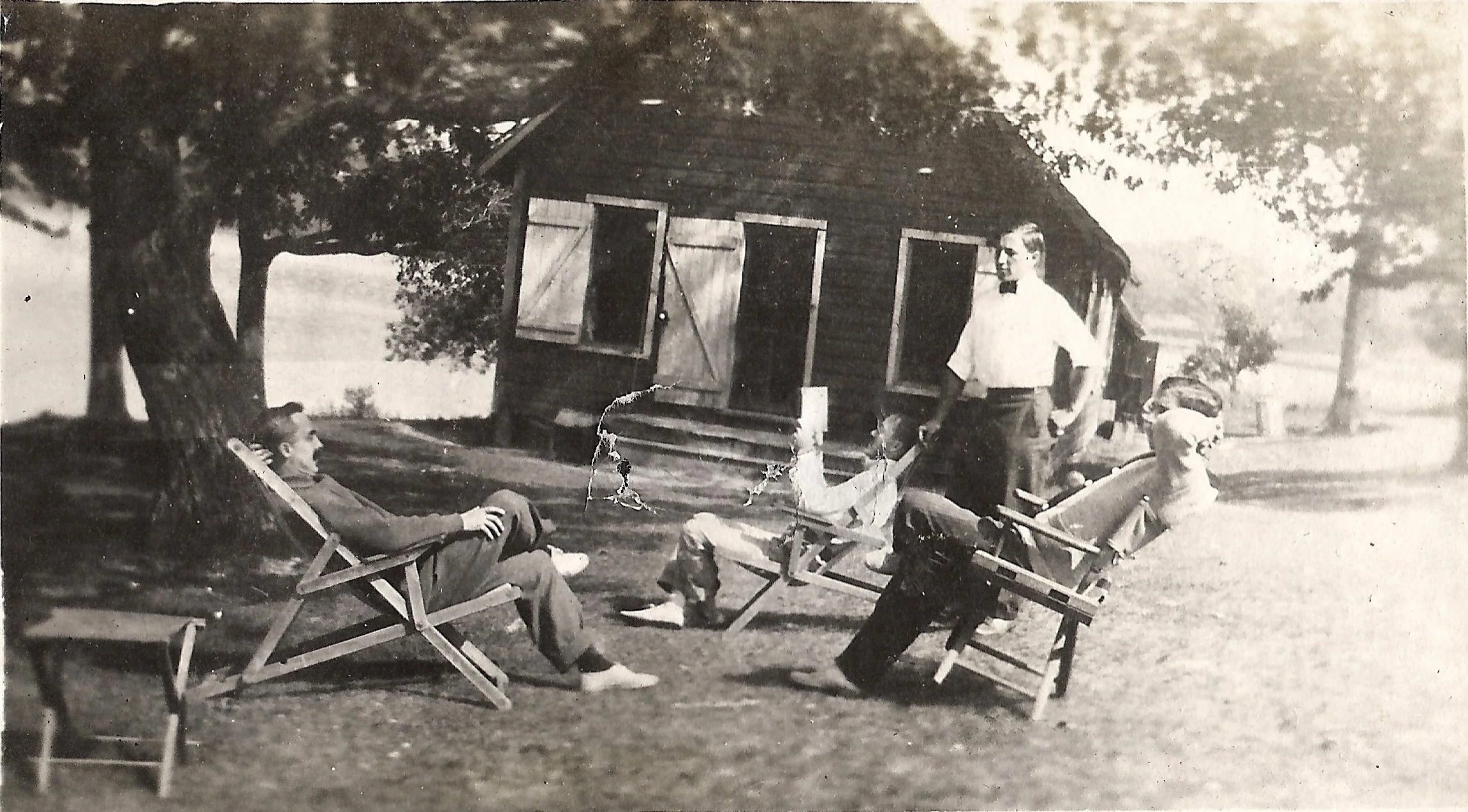 1900s - Staff lounging outside of the Assembly Building
