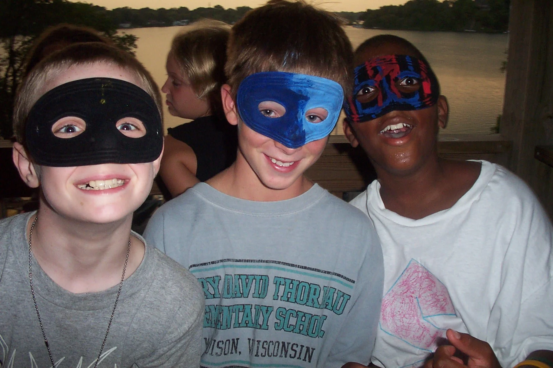 August 2005 - Campers pose on the Veranda with masks