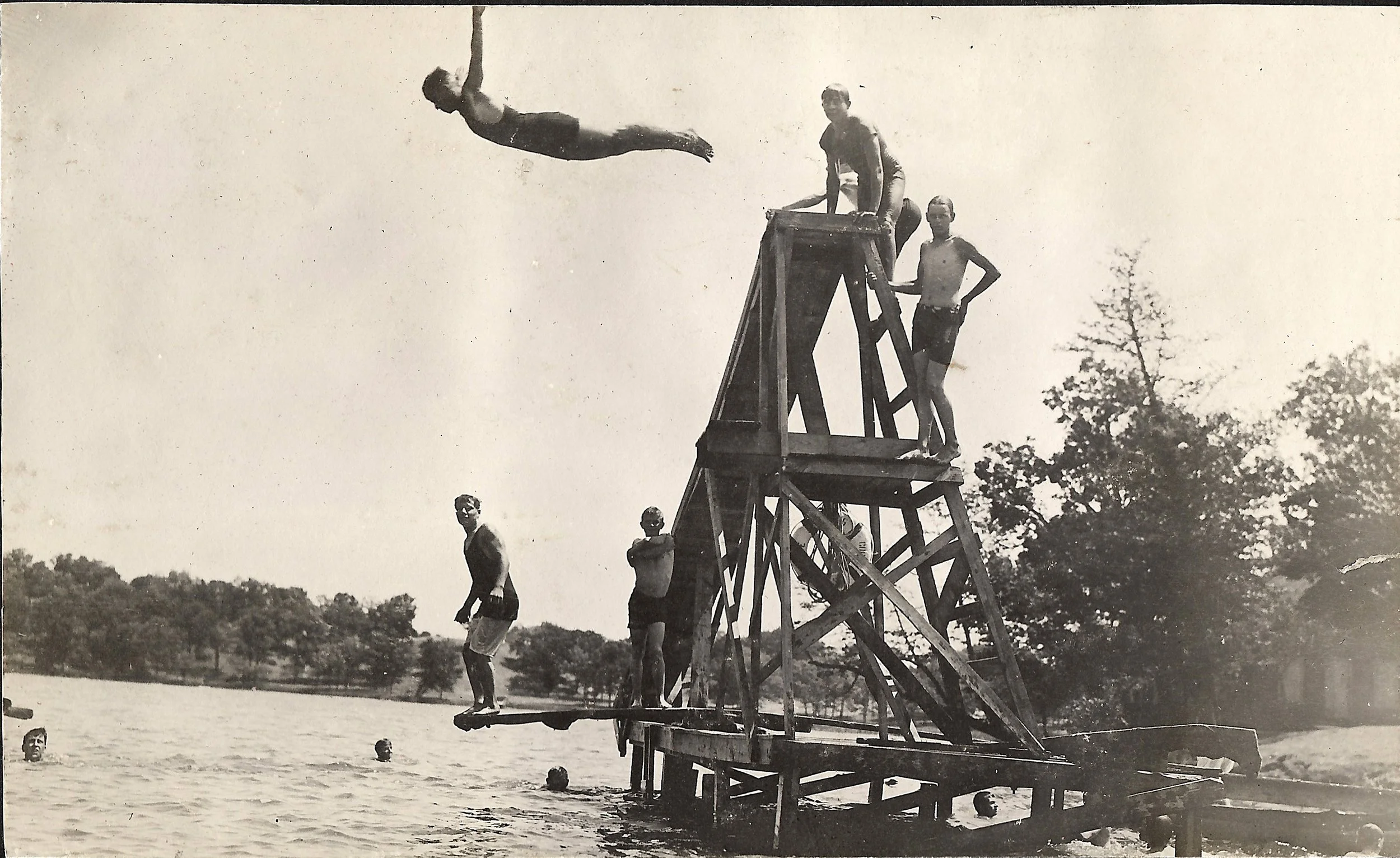 1900s - Camper diving off of the diving platform at the swimming area
