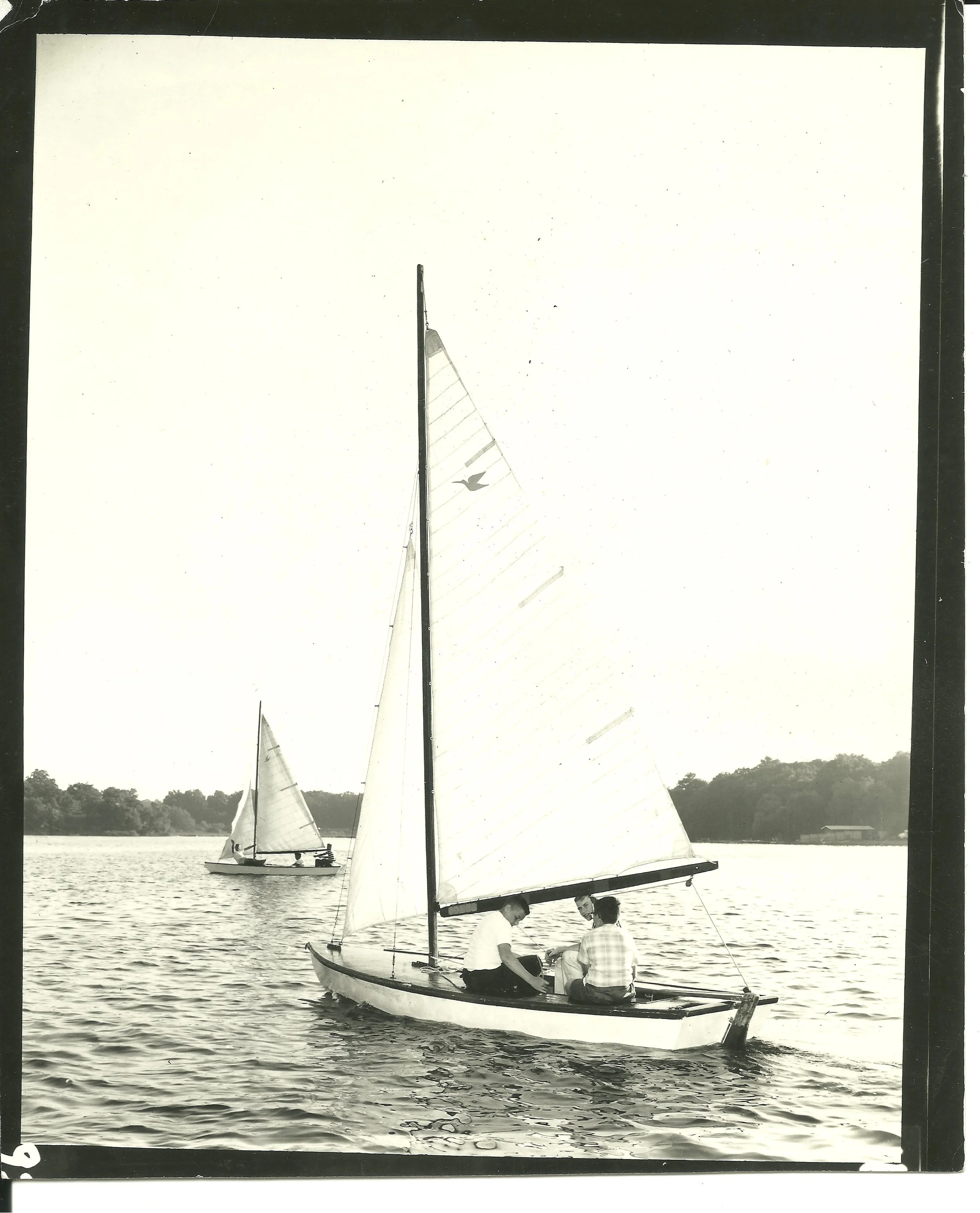 1960s - Campers sailing their boat on Phantom Lake