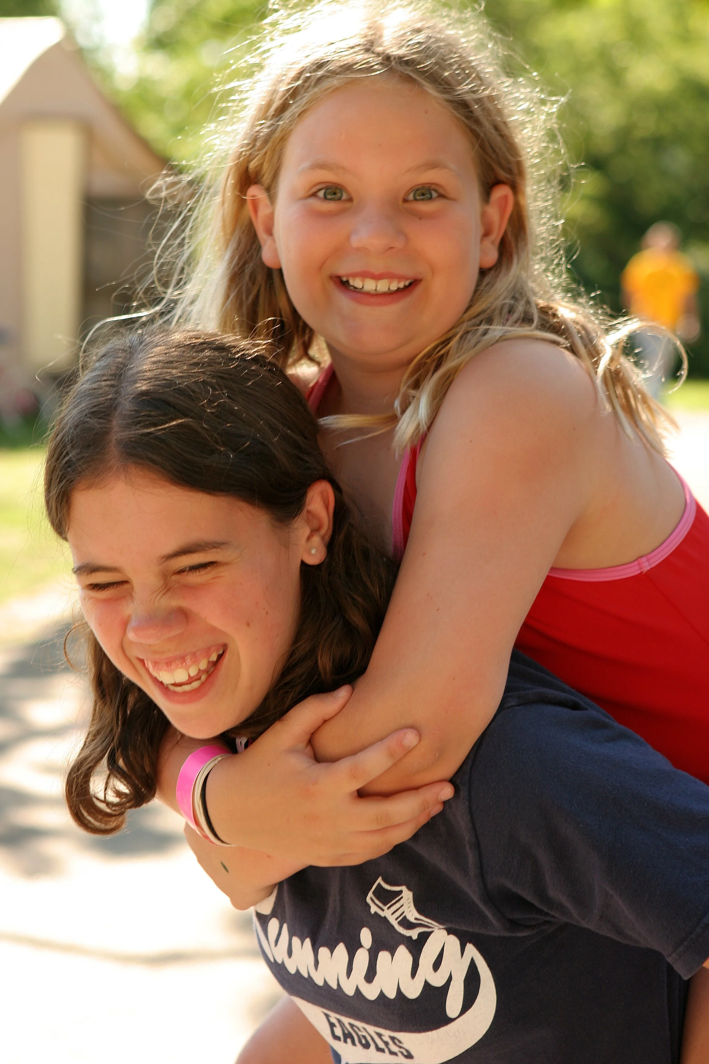 July 2005 - Campers smiling for a photo
(Pictured: Amelia Cleveland)