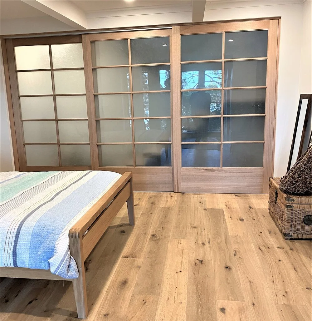 shoji style doors provide privacy whilst not compromising daylight