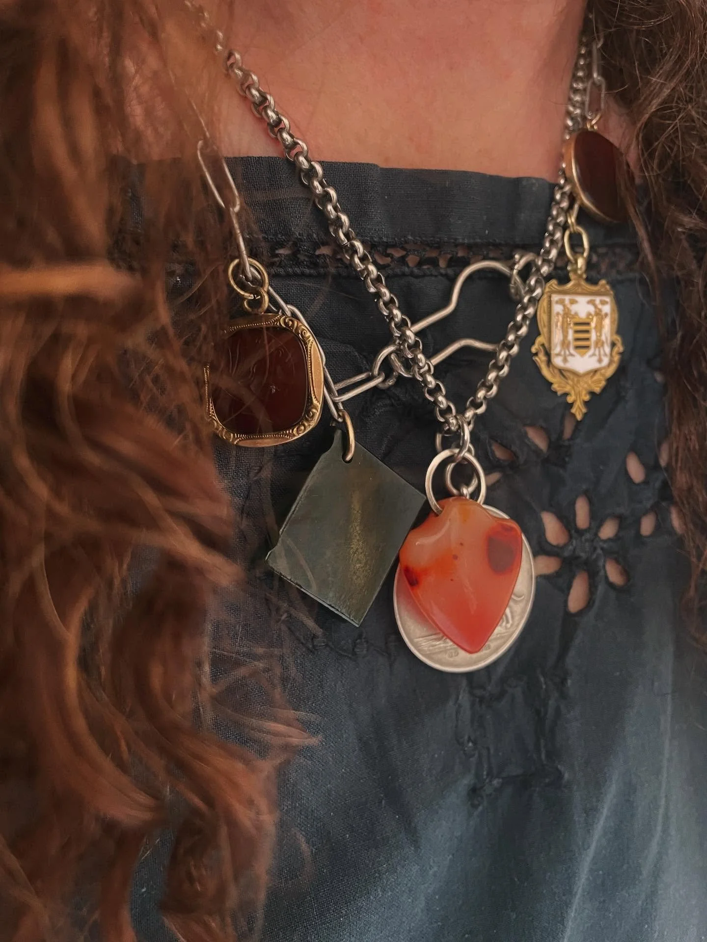 Second Talismanic is a keeper, made up of pieces that have been mine given a new way of wearing, but I needed something more.
So an antique jade book and agate carnelian shield to protect and tell a story...

Mermaid Jade has sold and I'm busy workin