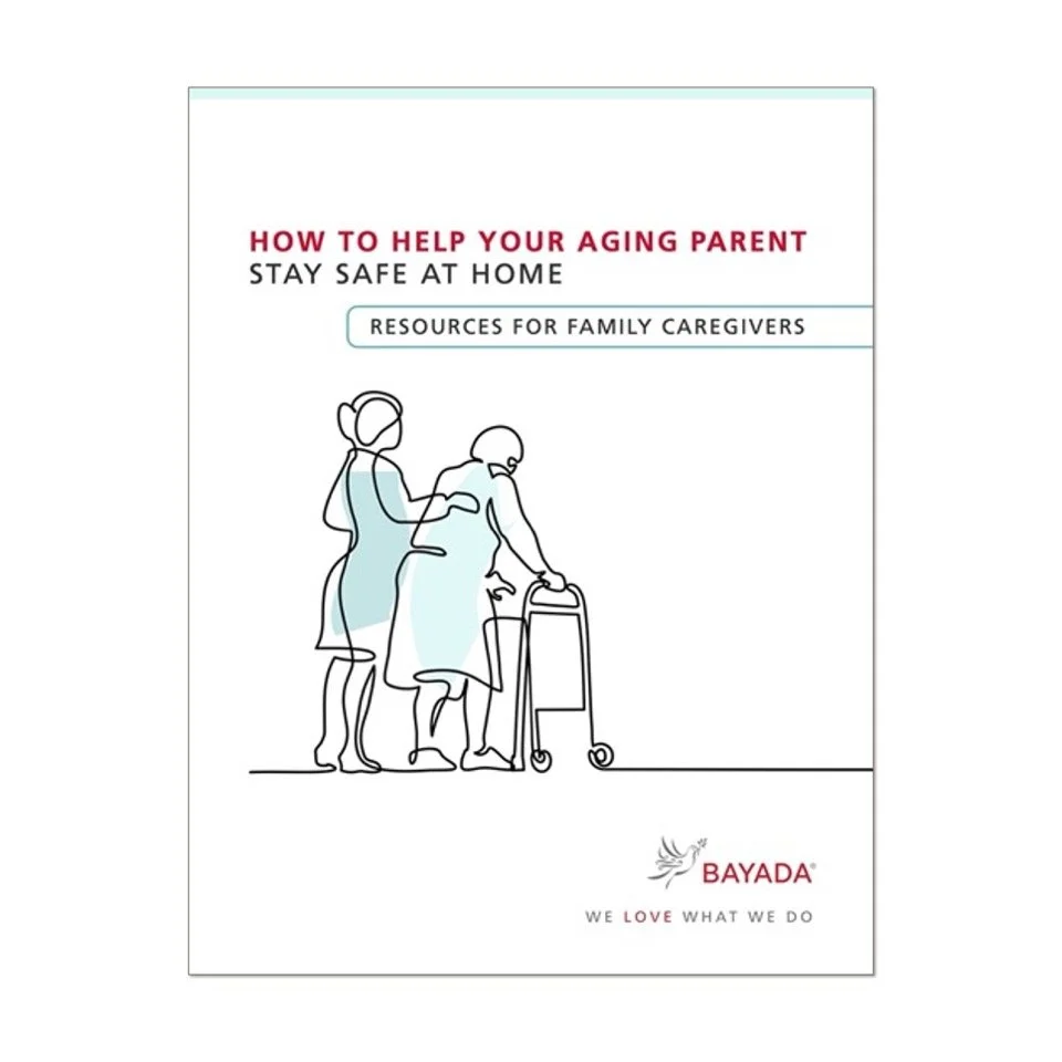 Cover page of a guide titled 'How to Help Your Aging Parent Stay Safe at Home', featuring a line drawing of a caregiver assisting an elderly person with a walker. The guide is by Bayada with the slogan 'We Love What We Do' at the bottom.