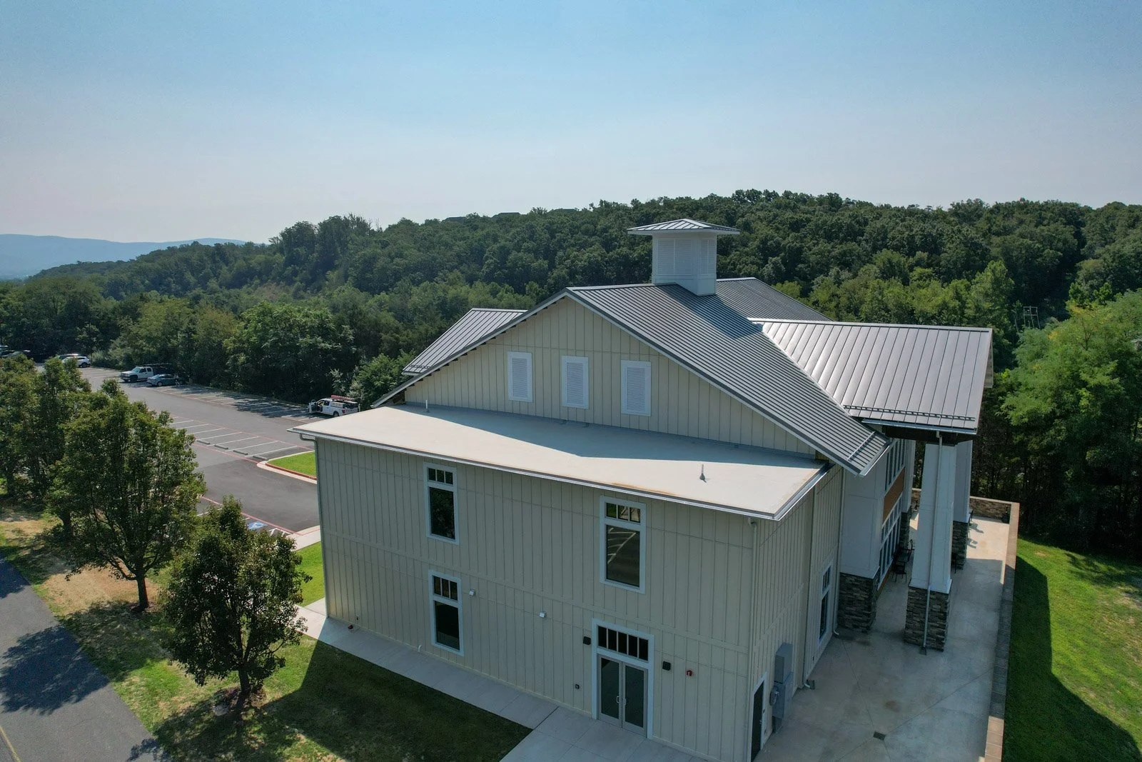 Rear aerial view of the completed new-construction roofing project in Massanutten, Virginia.