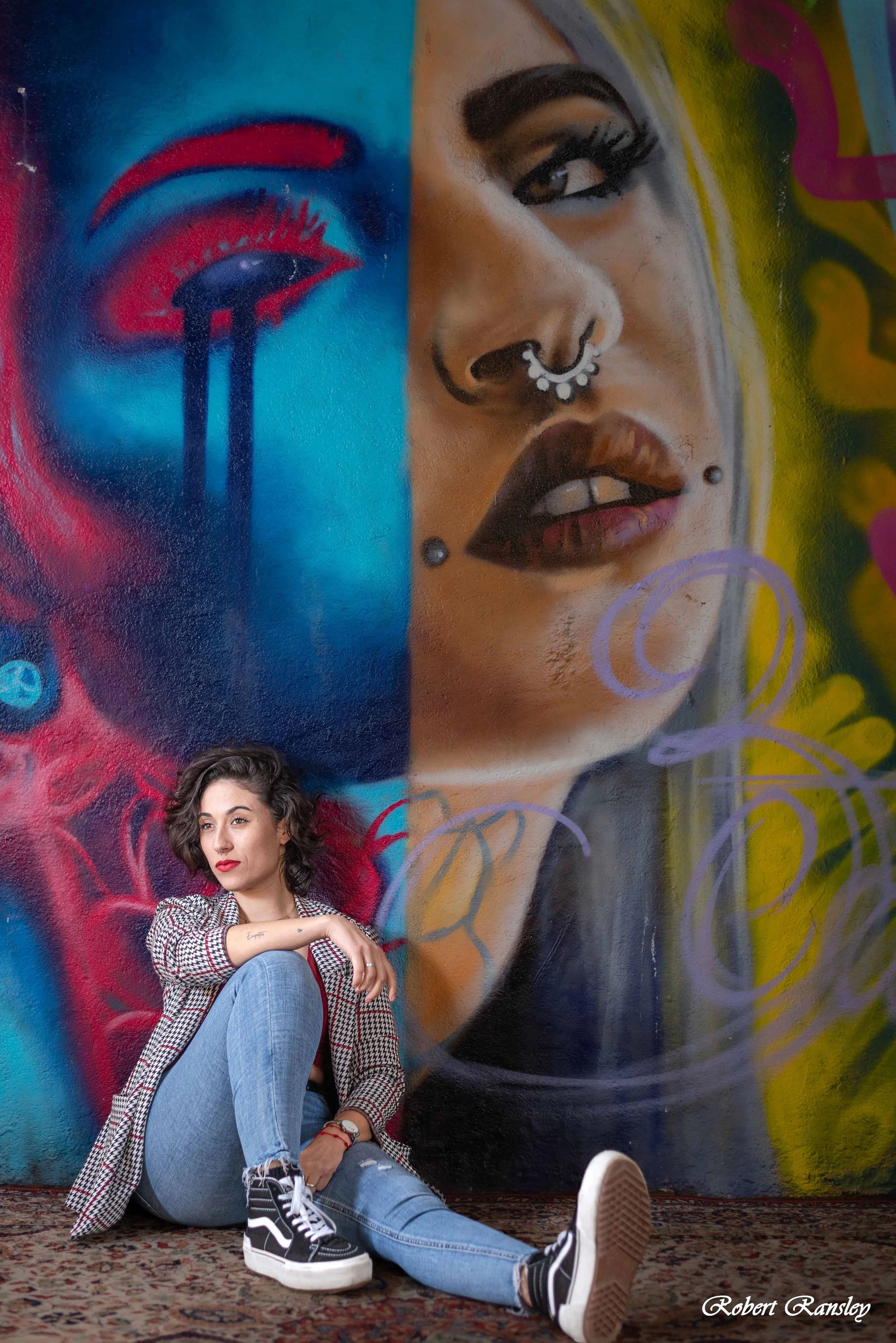 urban-graffiti-portrait-woman-sitting-colorful-street-art-spain-robert-ransley.jpg.jpg