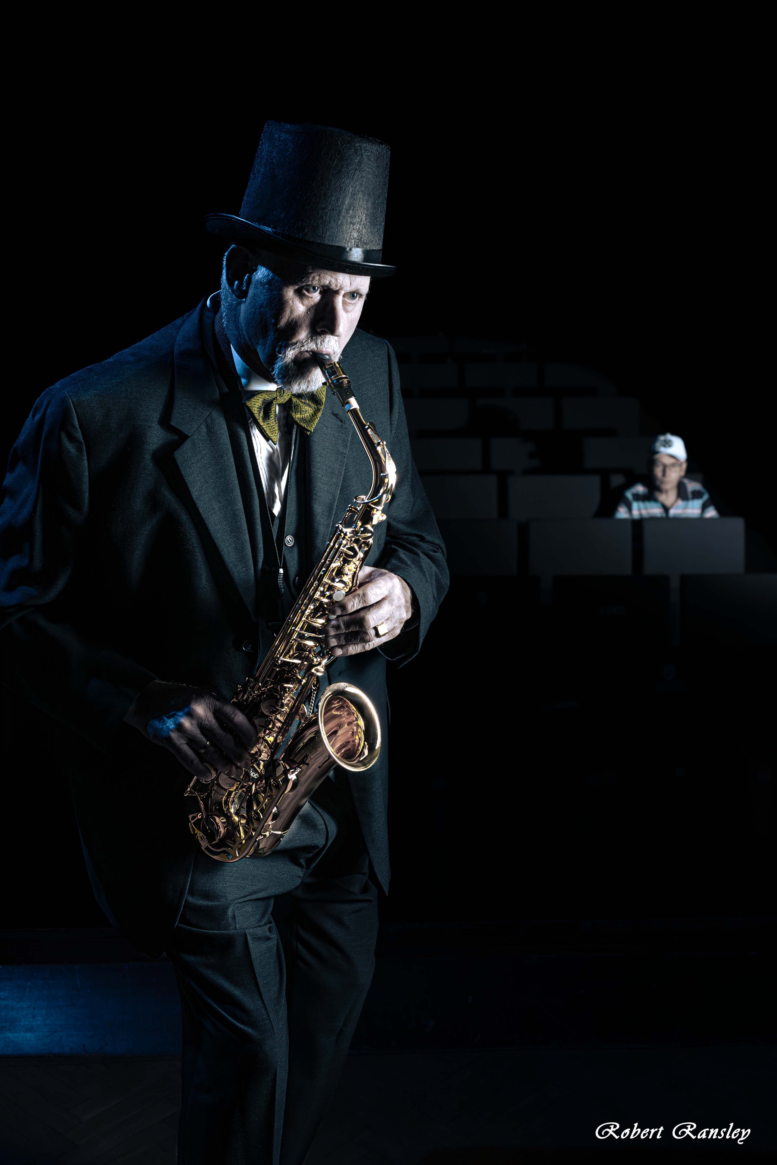 08-dramatic-portrait-saxophonist-performing-on-stage.jpg.jpg