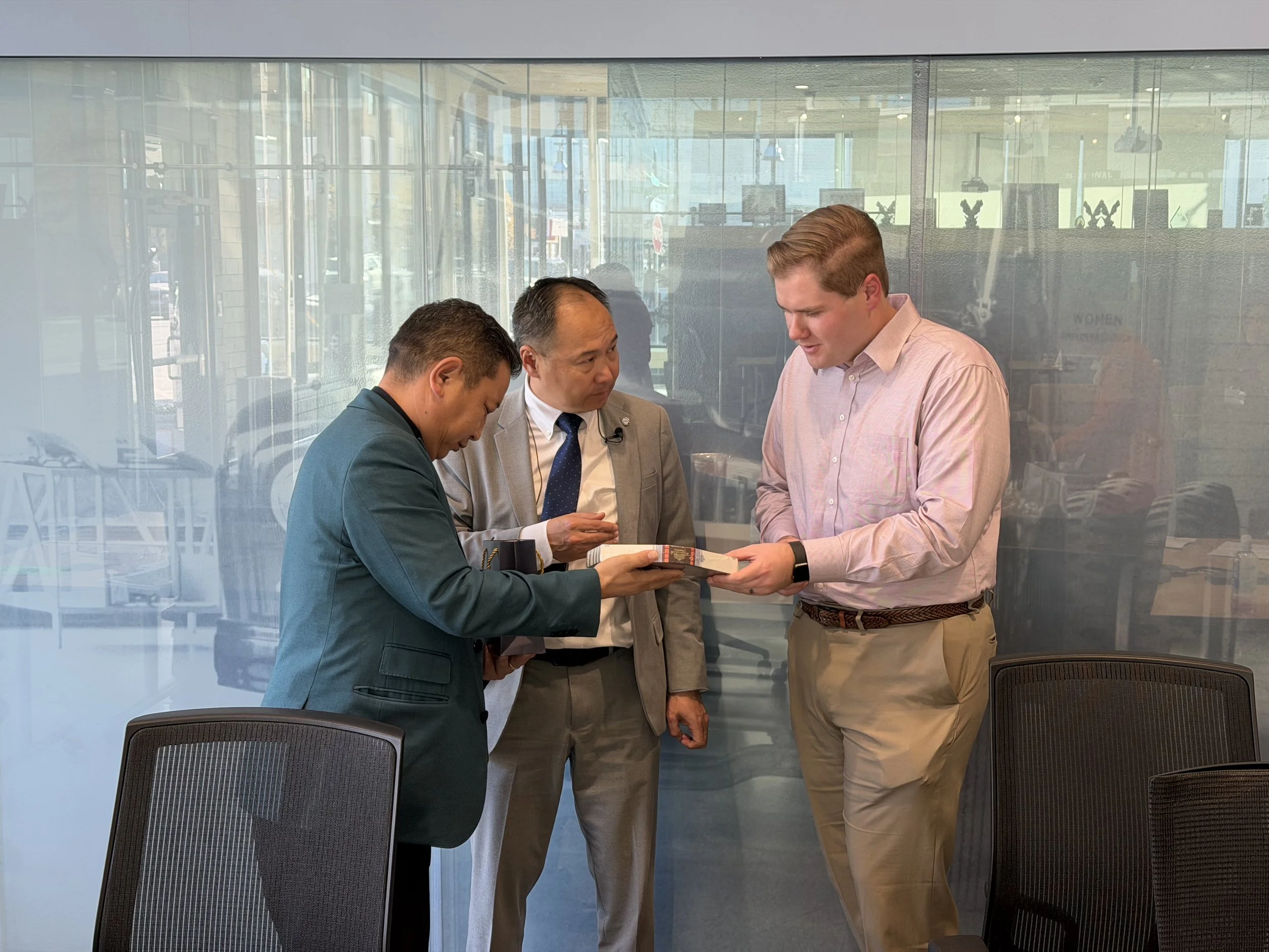 Mongolian Prosecutors with Joshua Sharum, Senator Lankford_s office gift.jpeg