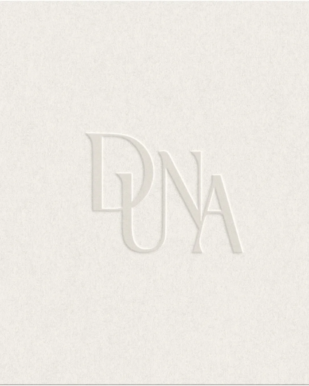 Duna is rooted in the landscape that surrounds us. Based between 2 Islands Lanzarote and Fuerteventura, we live and work among volcanic terrain and shifting dunes &mdash; places shaped by time, wind, and constant transformation. The dune embodies our