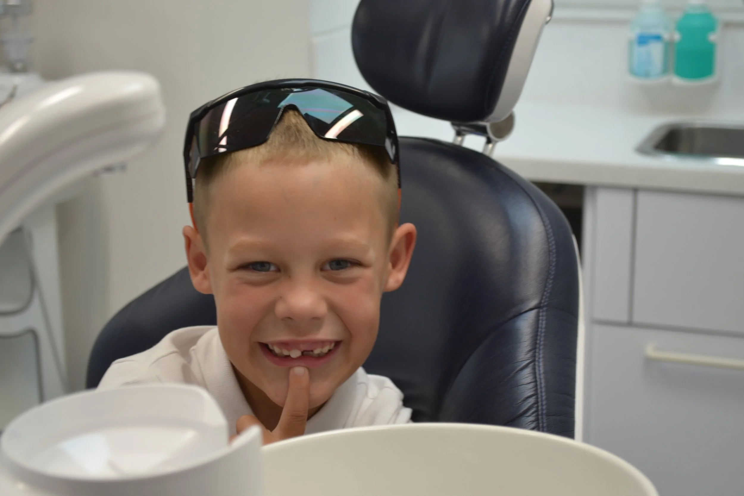 A young boy smiling in a dental chair at The Yorkshire Grey.