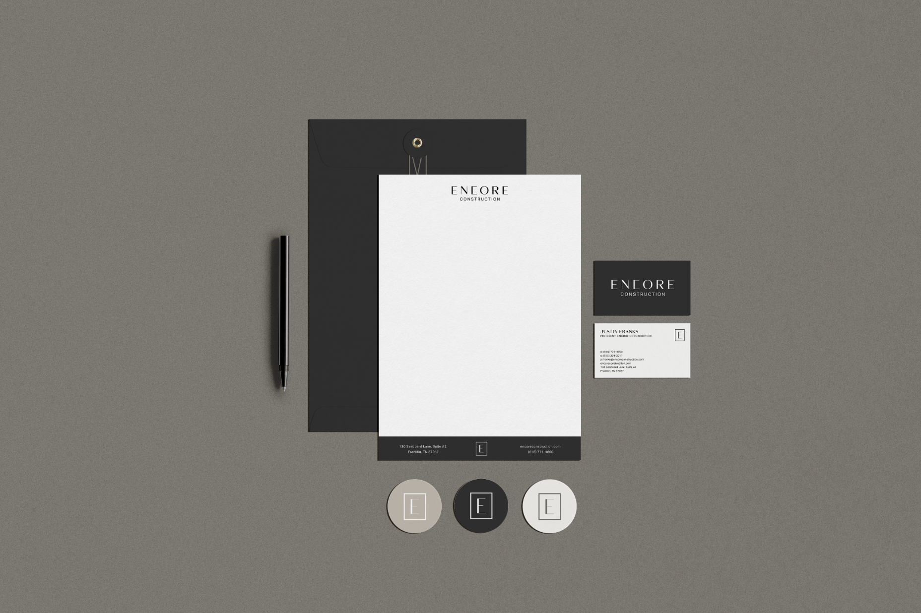 Stationery and website design for a modern custom home builder showcasing architectural project portfolios, clean layouts, and premium branding for residential construction firms.
