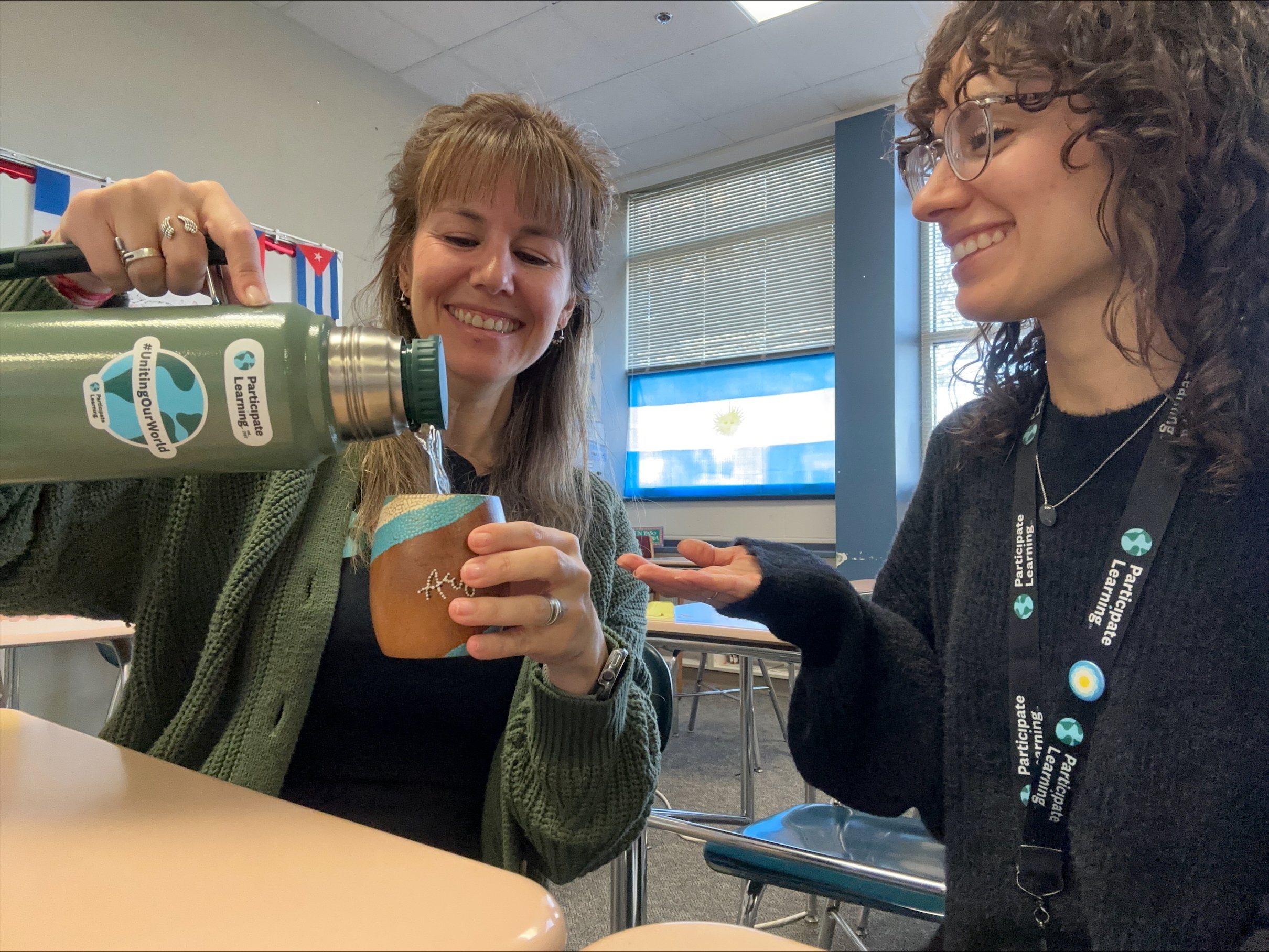 two women sharing mate
