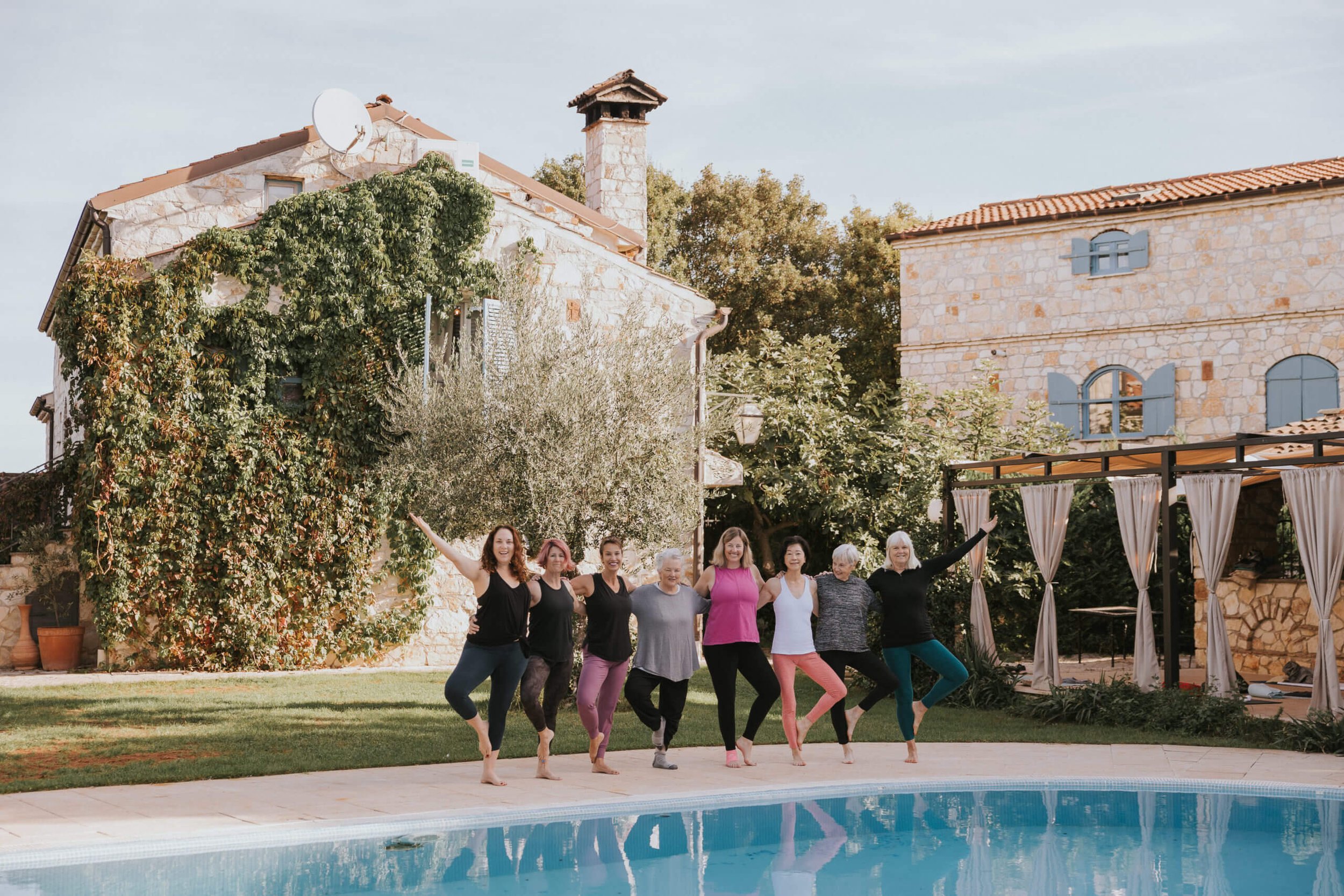 group doing yoga at the villa pool Croatia (Copy) (Copy)