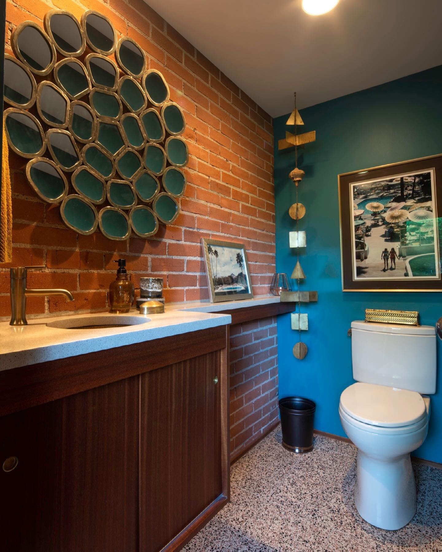 The other side of the brick wall that was discovered during demolition was conveniently located in the powder room, where exposing it was a no-brainer. In a sketch, I threw in a fun mirror as a place holder for something whimsical. Half way through c