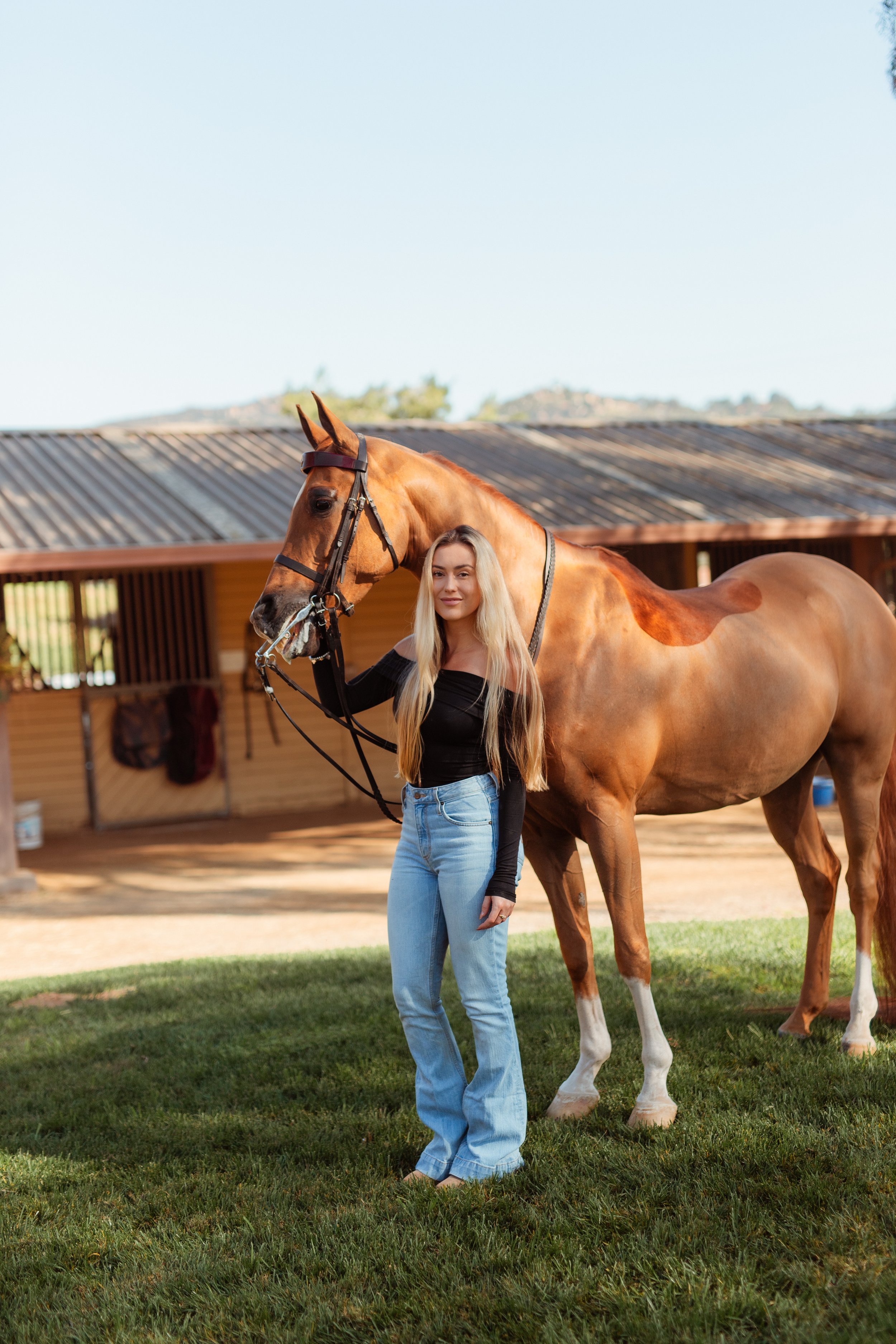 Horse girl aesthetic portrait of a Newport Beach rider embracing her horse during an equestrian photoshoot in San Marcos, California. Soft, natural light highlighting equestrian life, horse love, and authentic connection. Horse photography by Souther