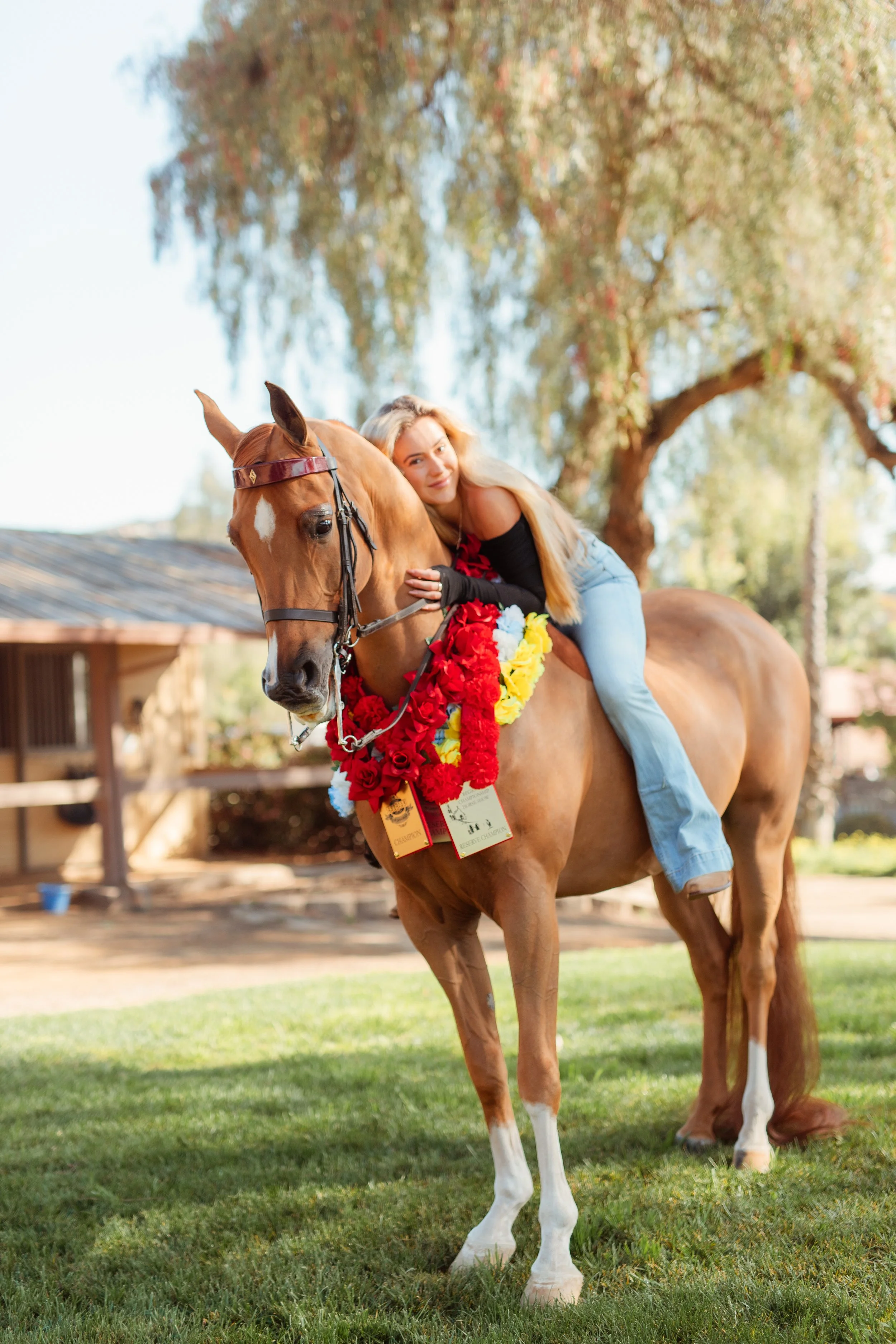 Southern California horse riding aesthetic photoshoot in San Marcos featuring a Newport Beach equestrian girl and her horse against open hills and arena backdrop. Equestrian lifestyle photography capturing movement, freedom, and horse girl style by S