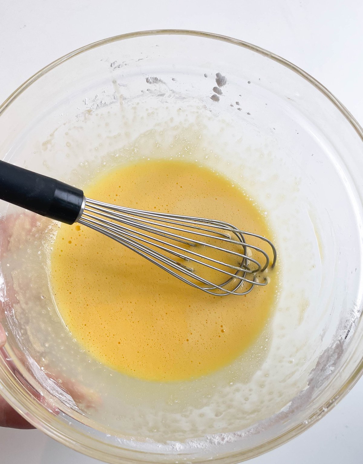 Separately whisk egg yolks, whole egg and cornstarch.