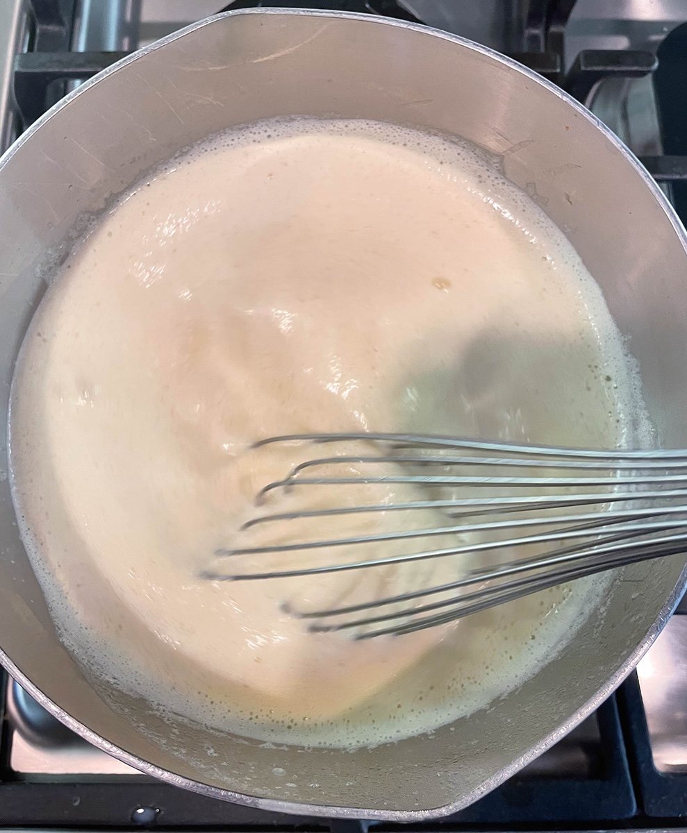 Whisk constantly until thickened over medium low heat.