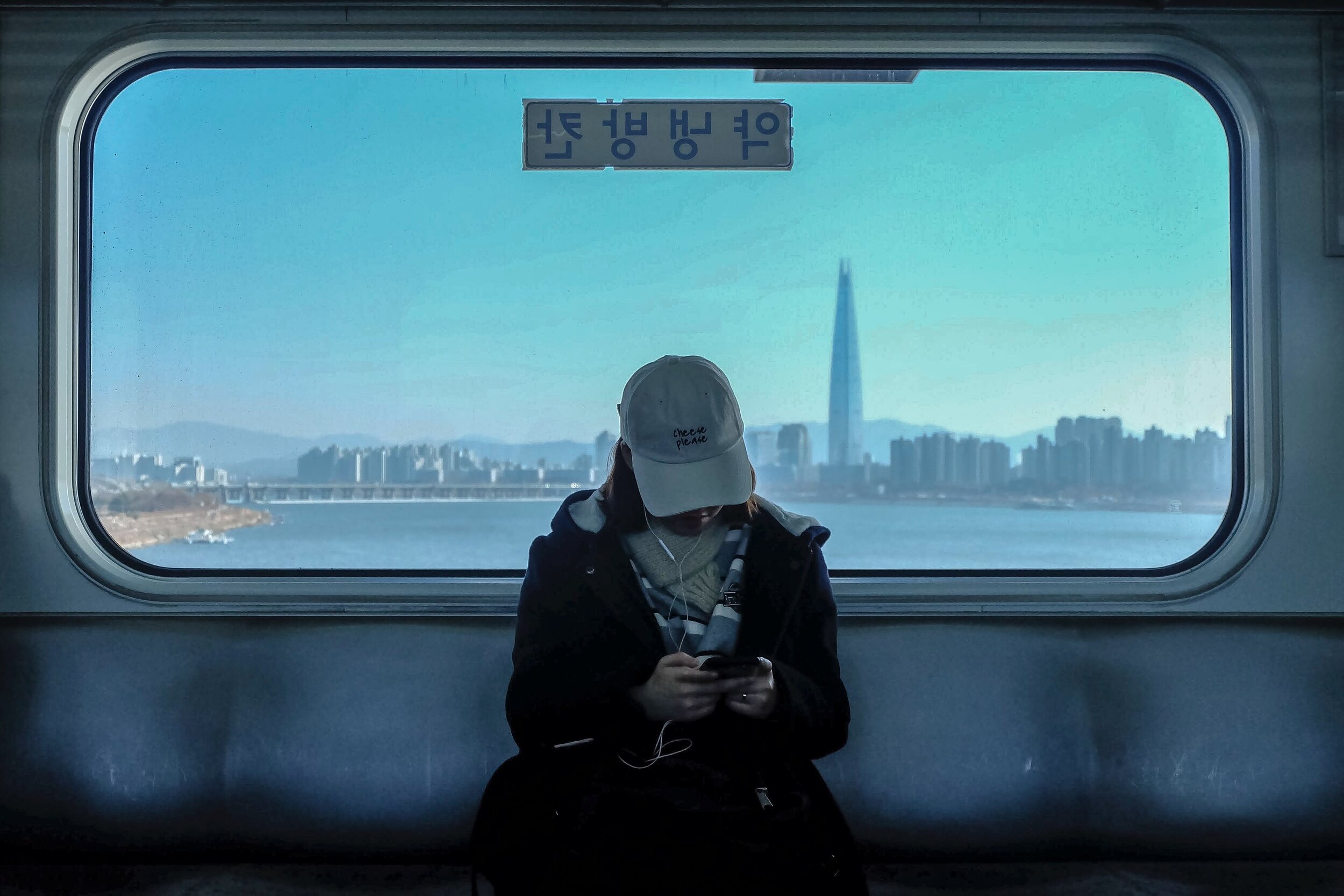 A Korean woman on a train