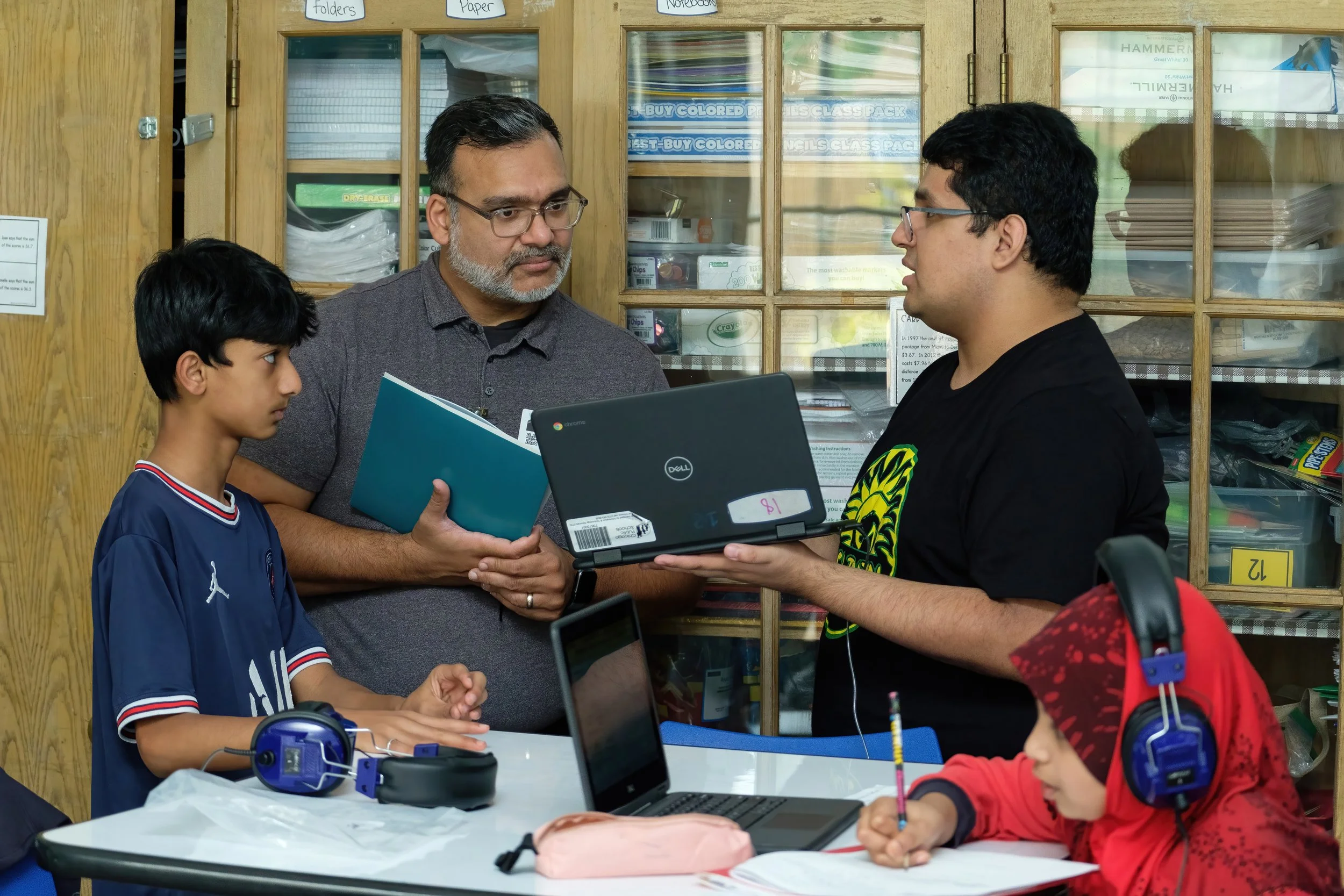 Miguel Melchor shares a student's virtual assignment with another educator.