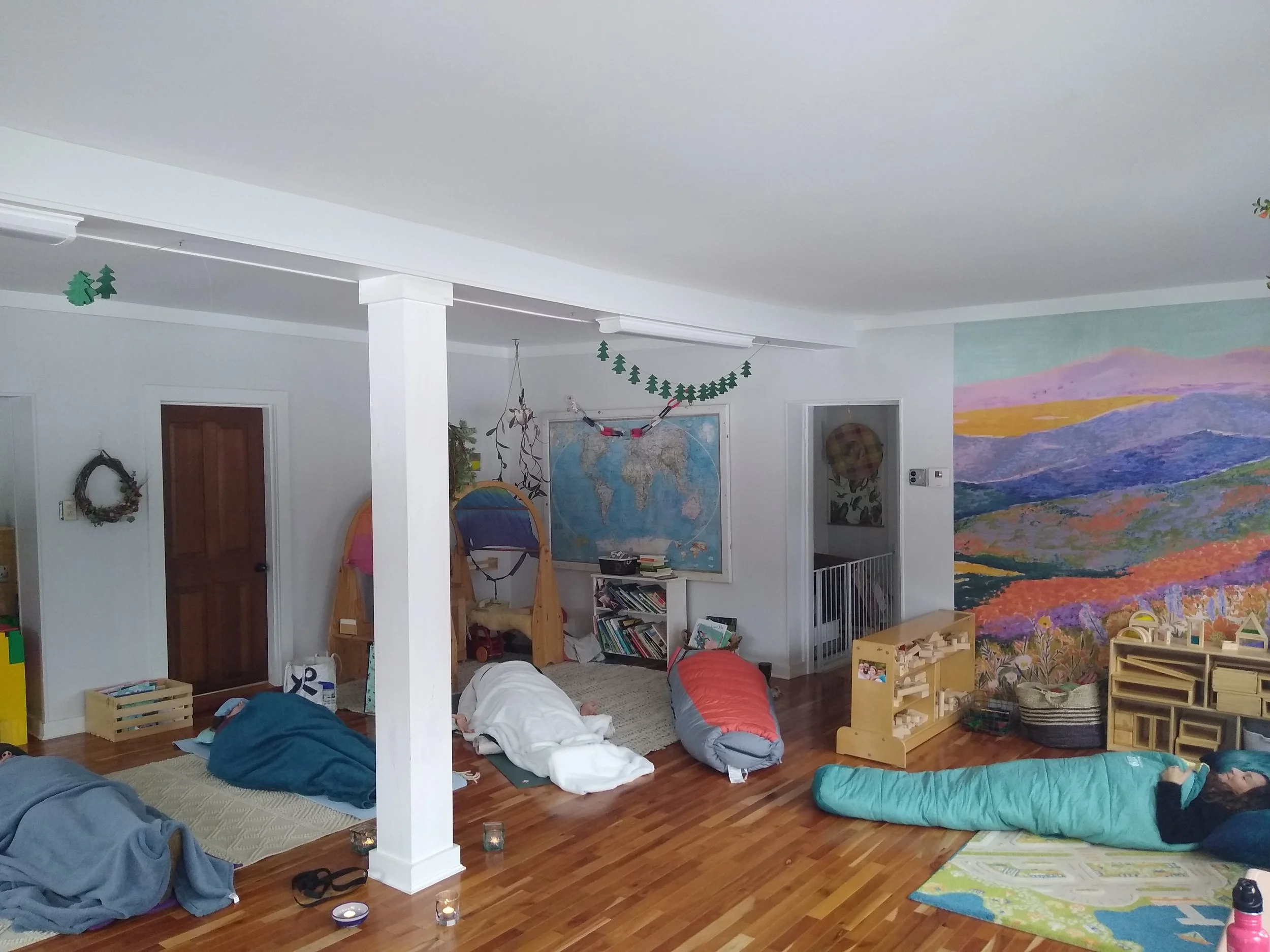A group of women napping in sleeping bags
