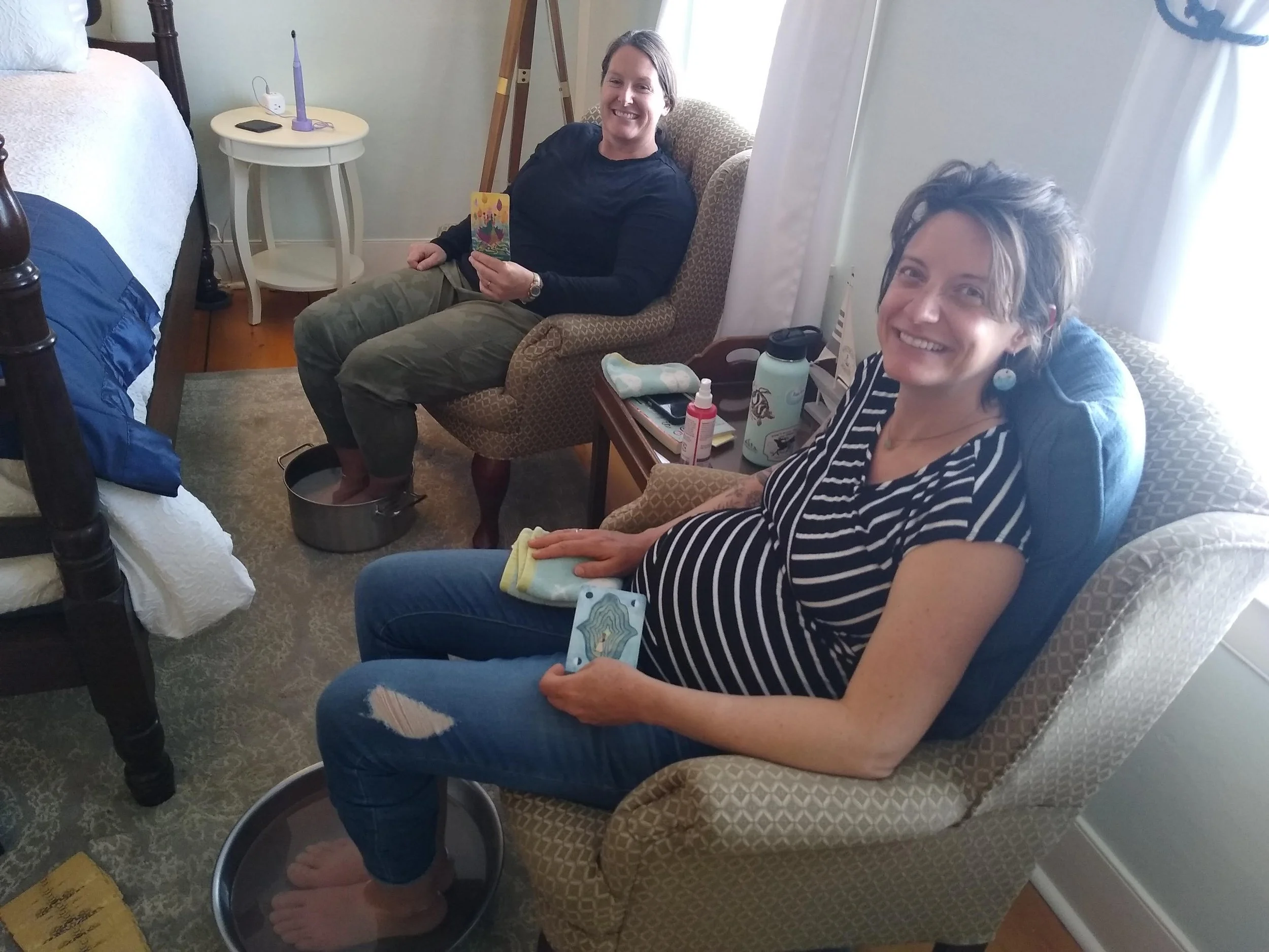 2 women getting a foot bath