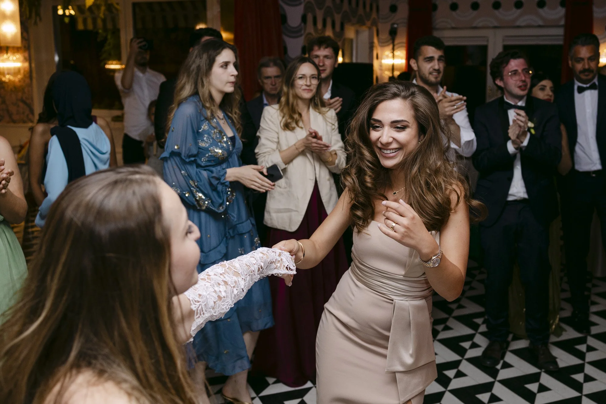 people are having fun during the party at fernblick wedding