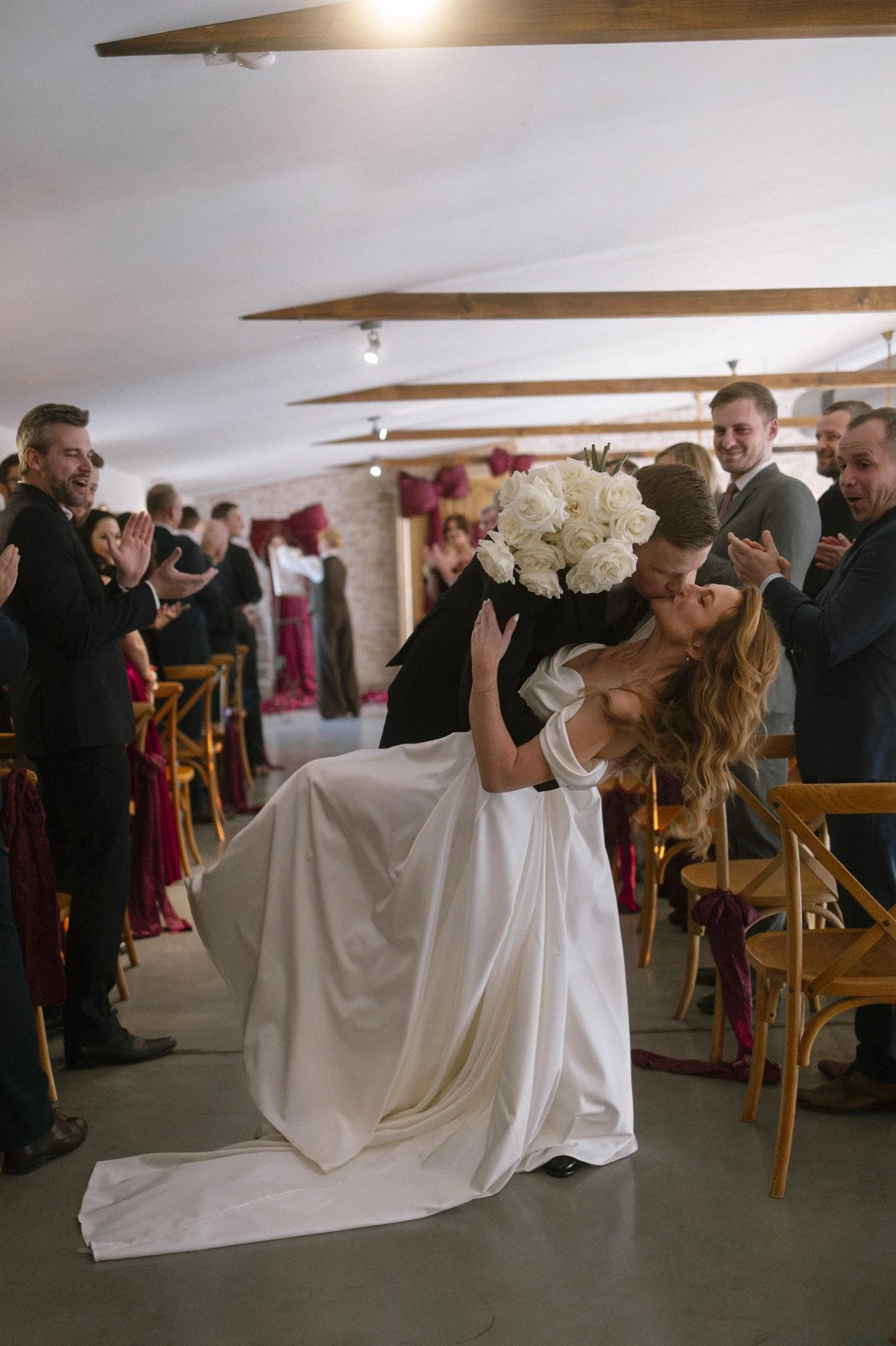 Bride and groom kissing after ceremony at Villa Love wedding