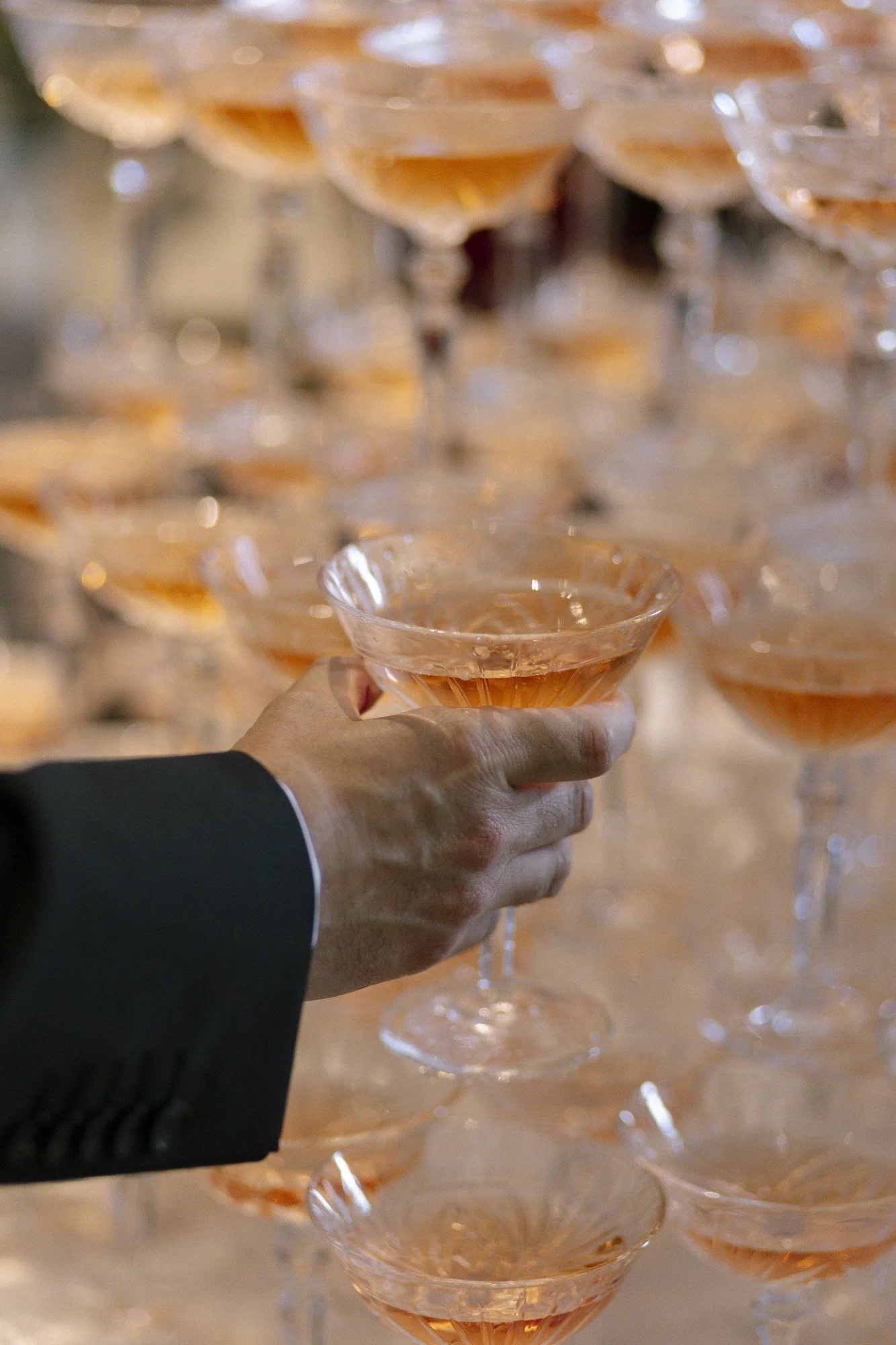 glass from the champagne tower, fernblick wedding photographer