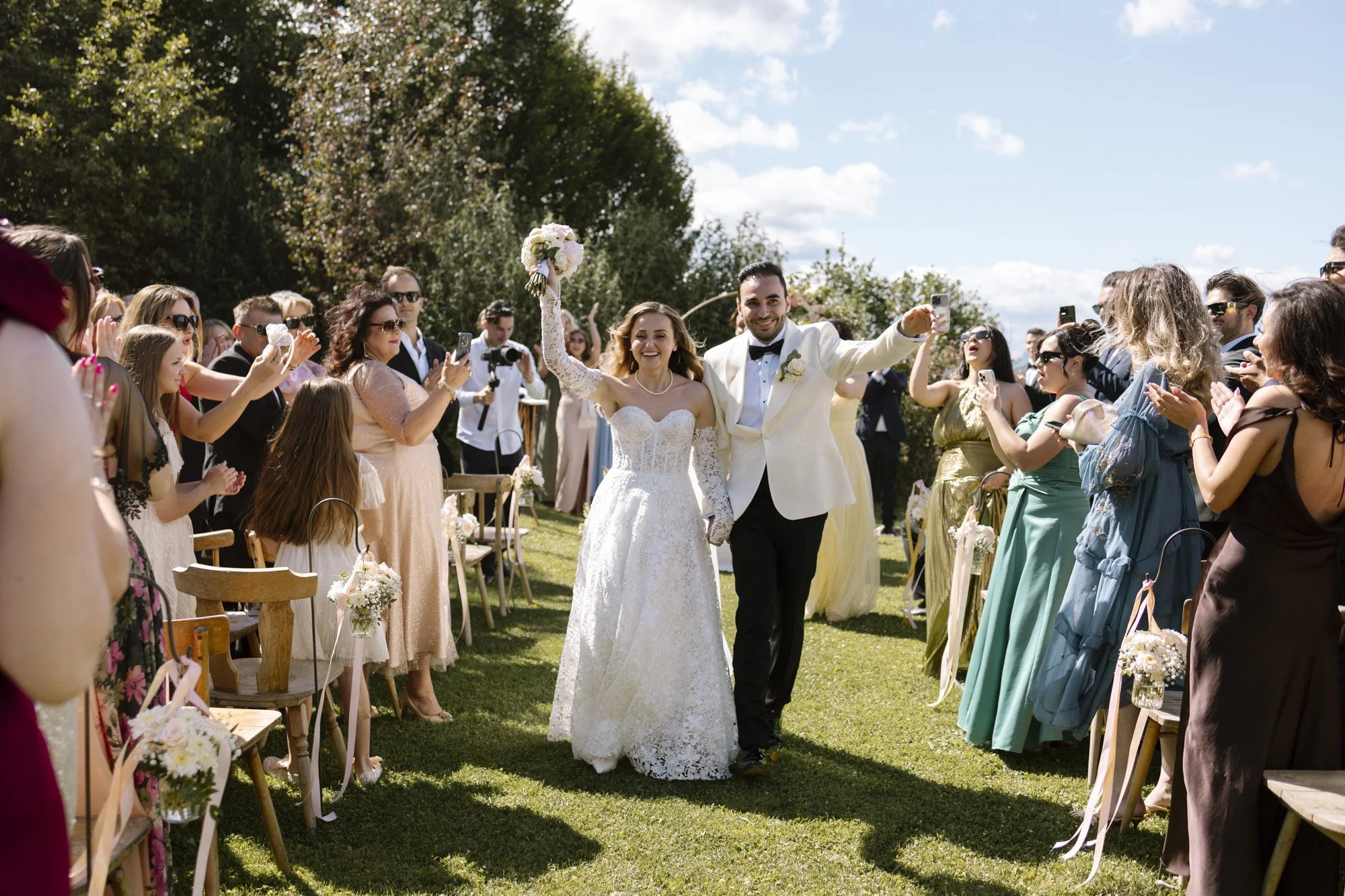 bride and groom exit from the wedding ceremony, outdoor wedding at fernblick