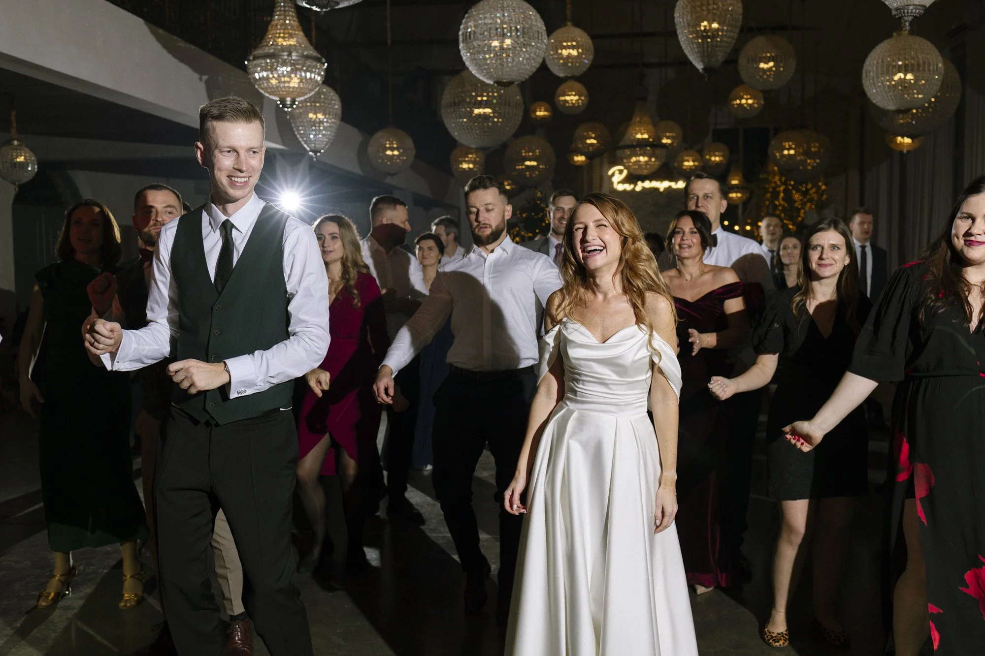bride and groom dancing during wedding reception at villa love