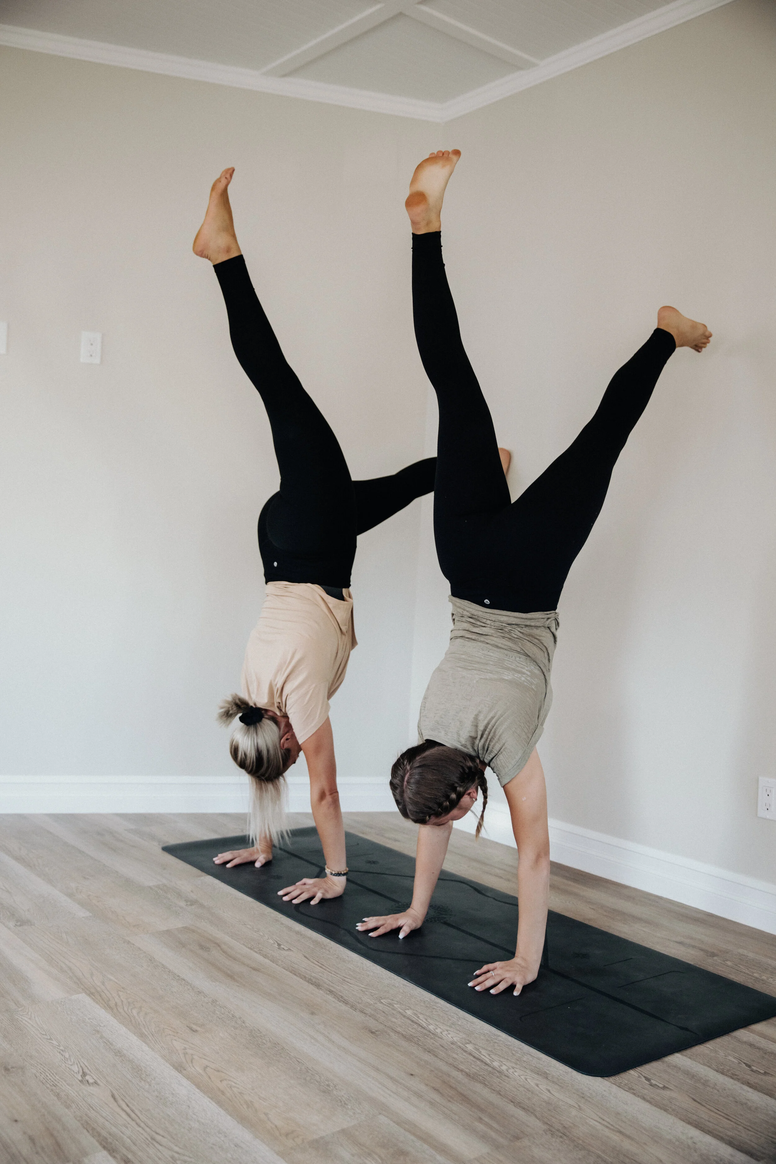 2 gals handstand w wall.jpg