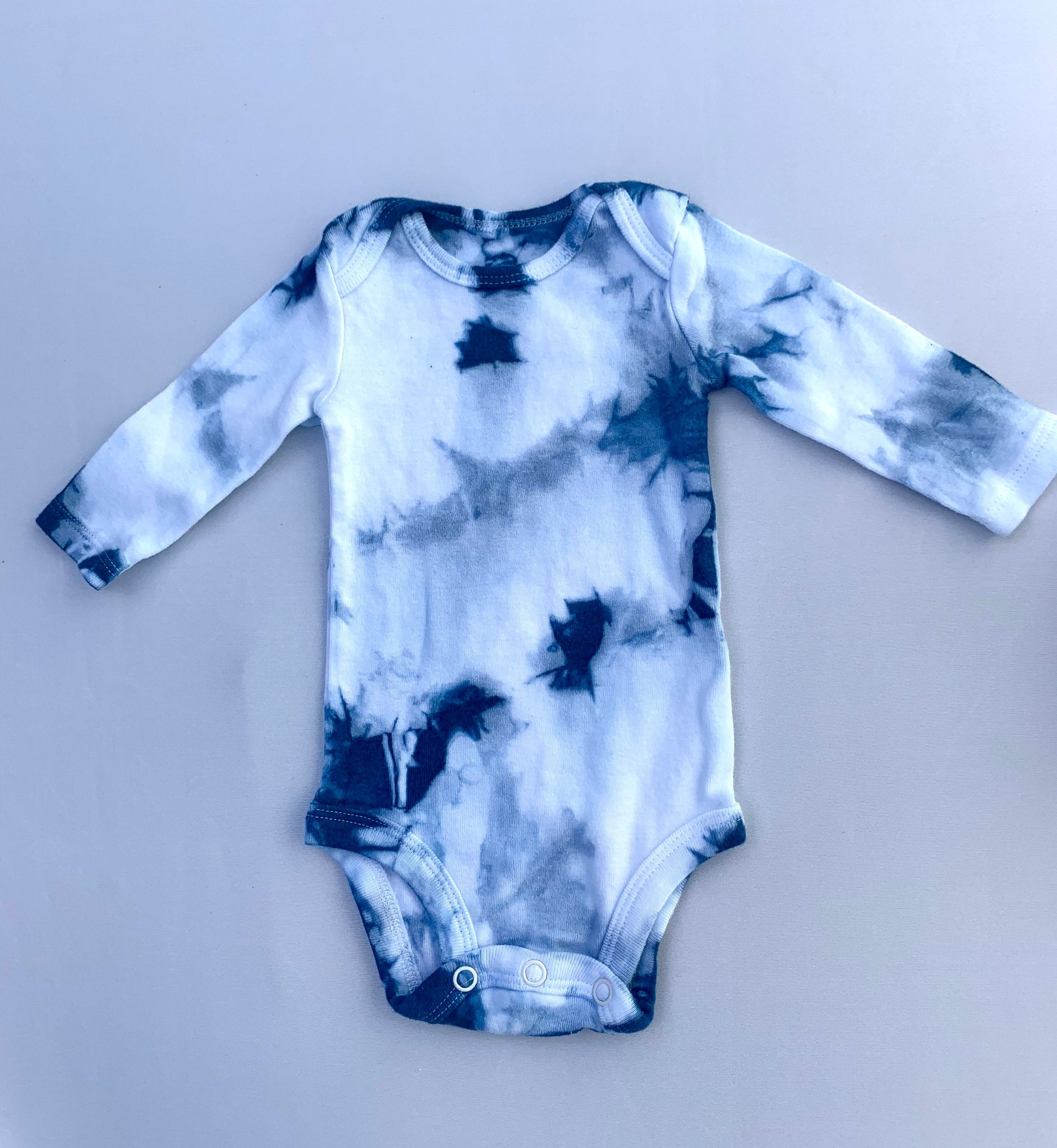 Newborn long sleeve bodysuit onesie - Shibori tie dyed with plant-based indigo
