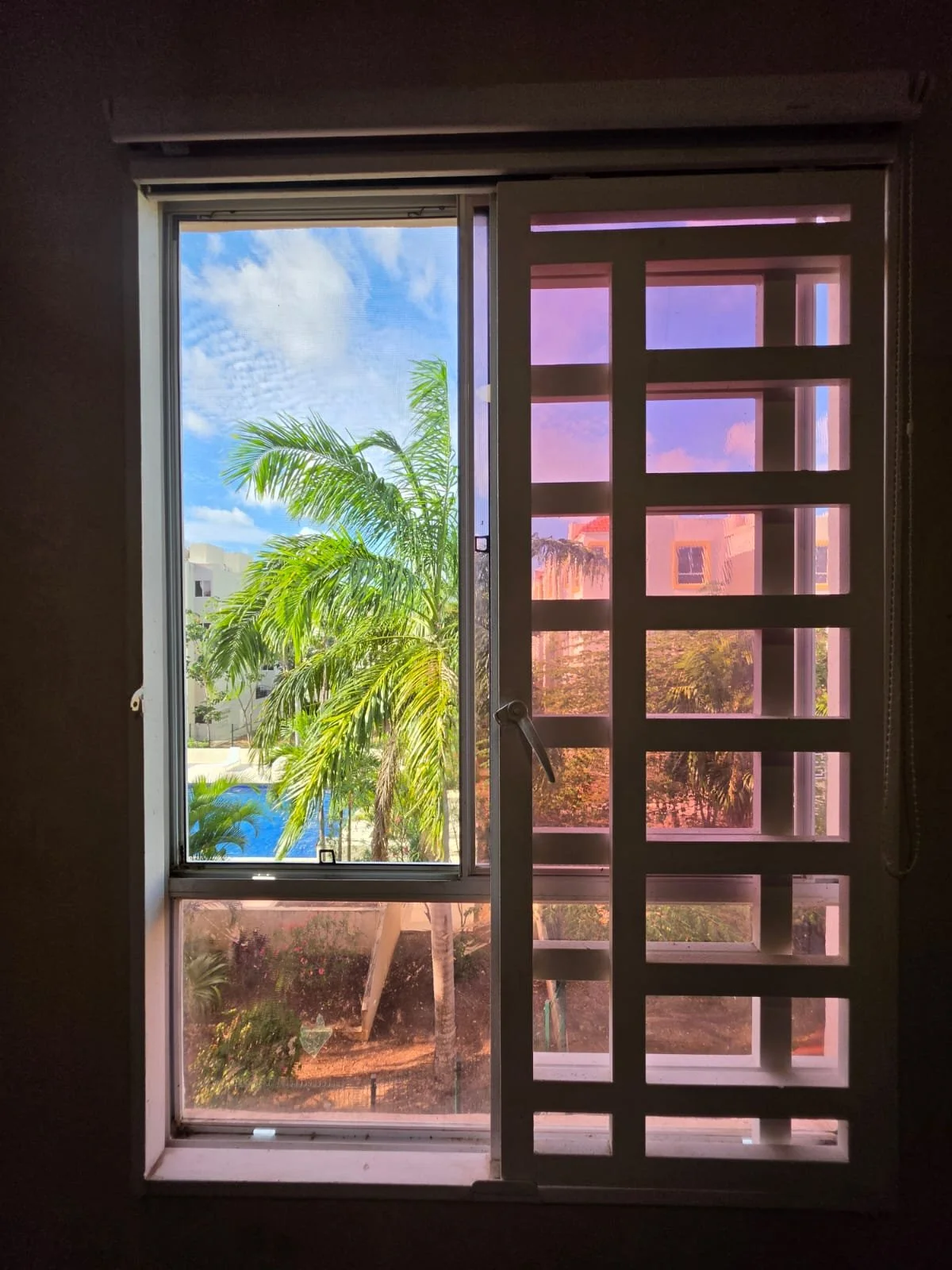 Vista a la alberca desde la ventana, departamento en renta en Aldea Tulum, Tulum