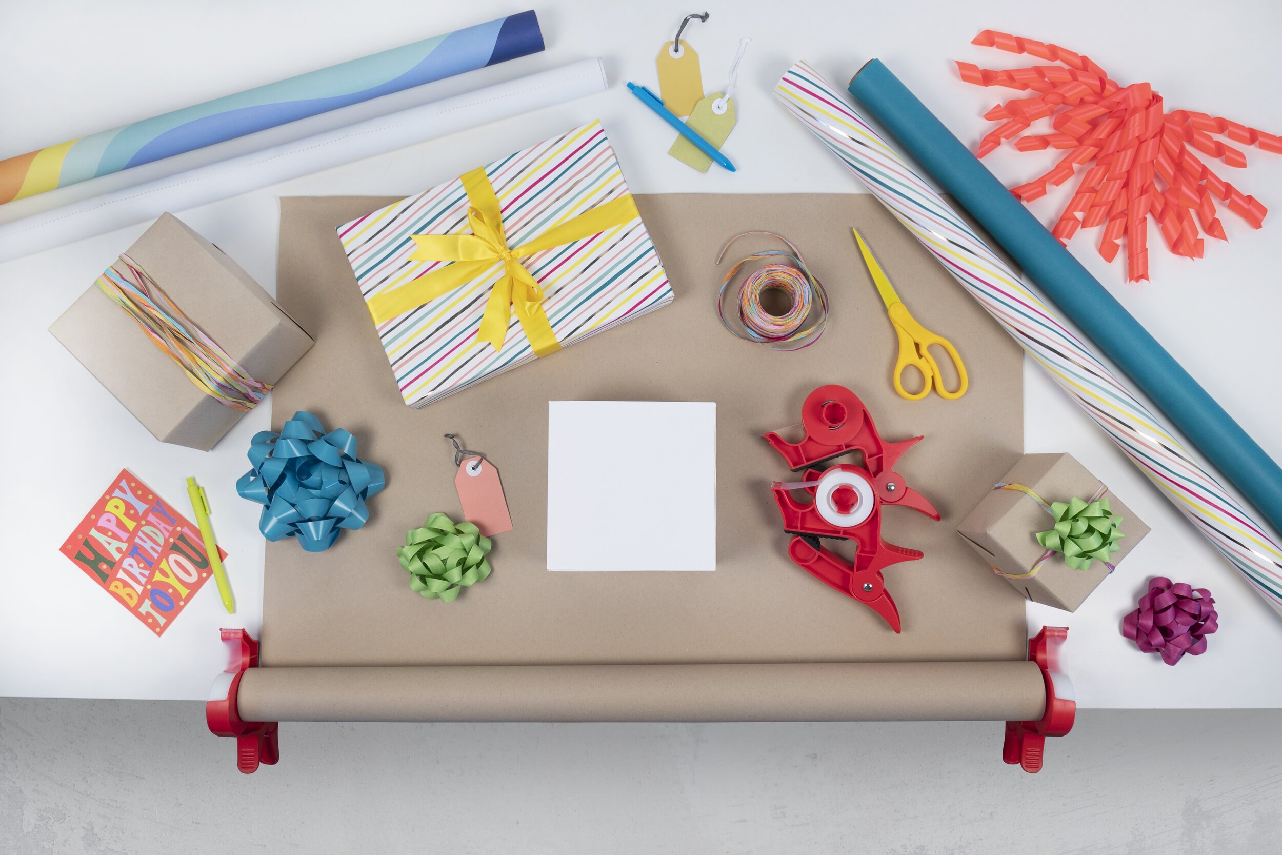 Wrap Mate™ - Innovative Tabletop Wrapping Paper & Tape Holder