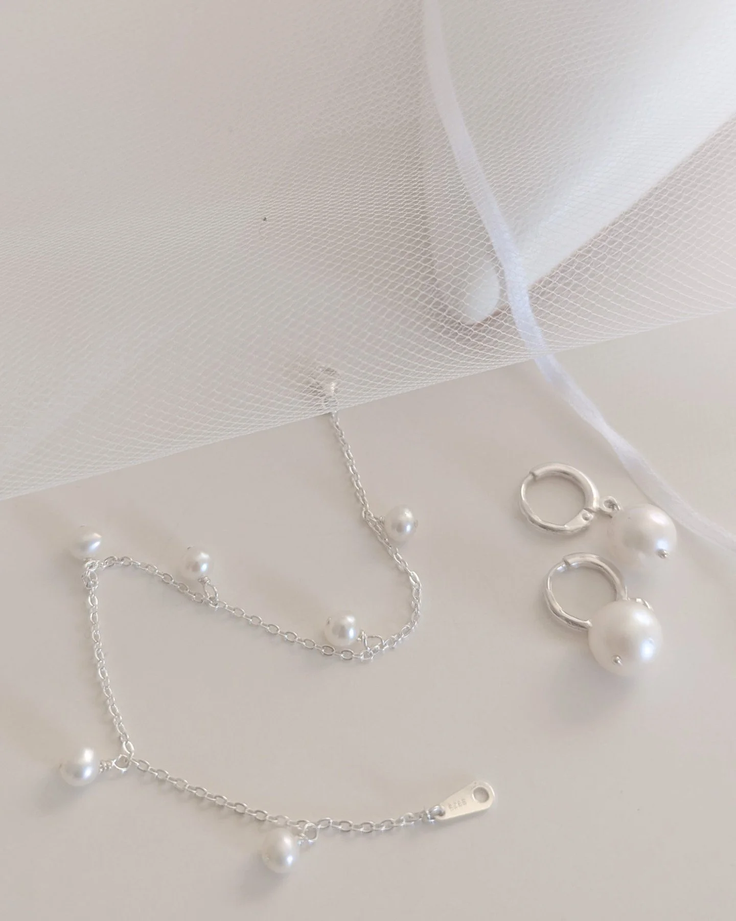 Simple drop earrings and pearl bracelet make a classic pair. 

#pearlearrings #pearlbracelet #weddingpearls #handmadejewlry #weddingjewelry #bridaljewelry #pearljewelry #bridalaccessories #wedddingaccessories #sterlingsilverjewelry