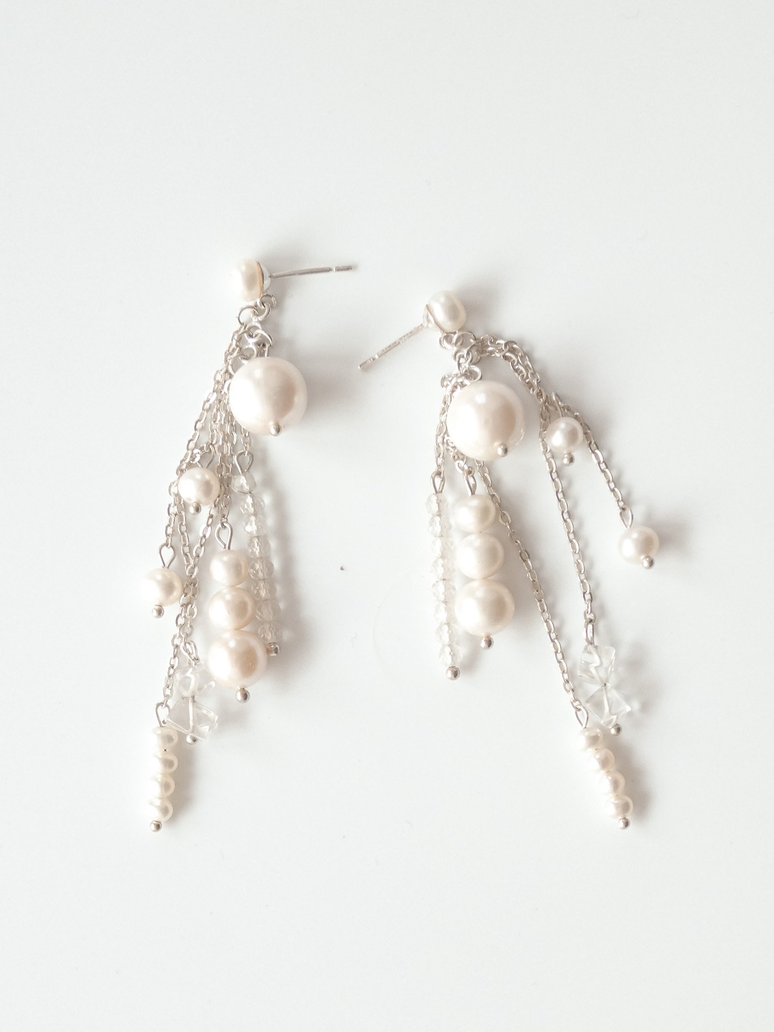 Freshwater pearl and quartz chandelier earrings. Made with sterling silver.