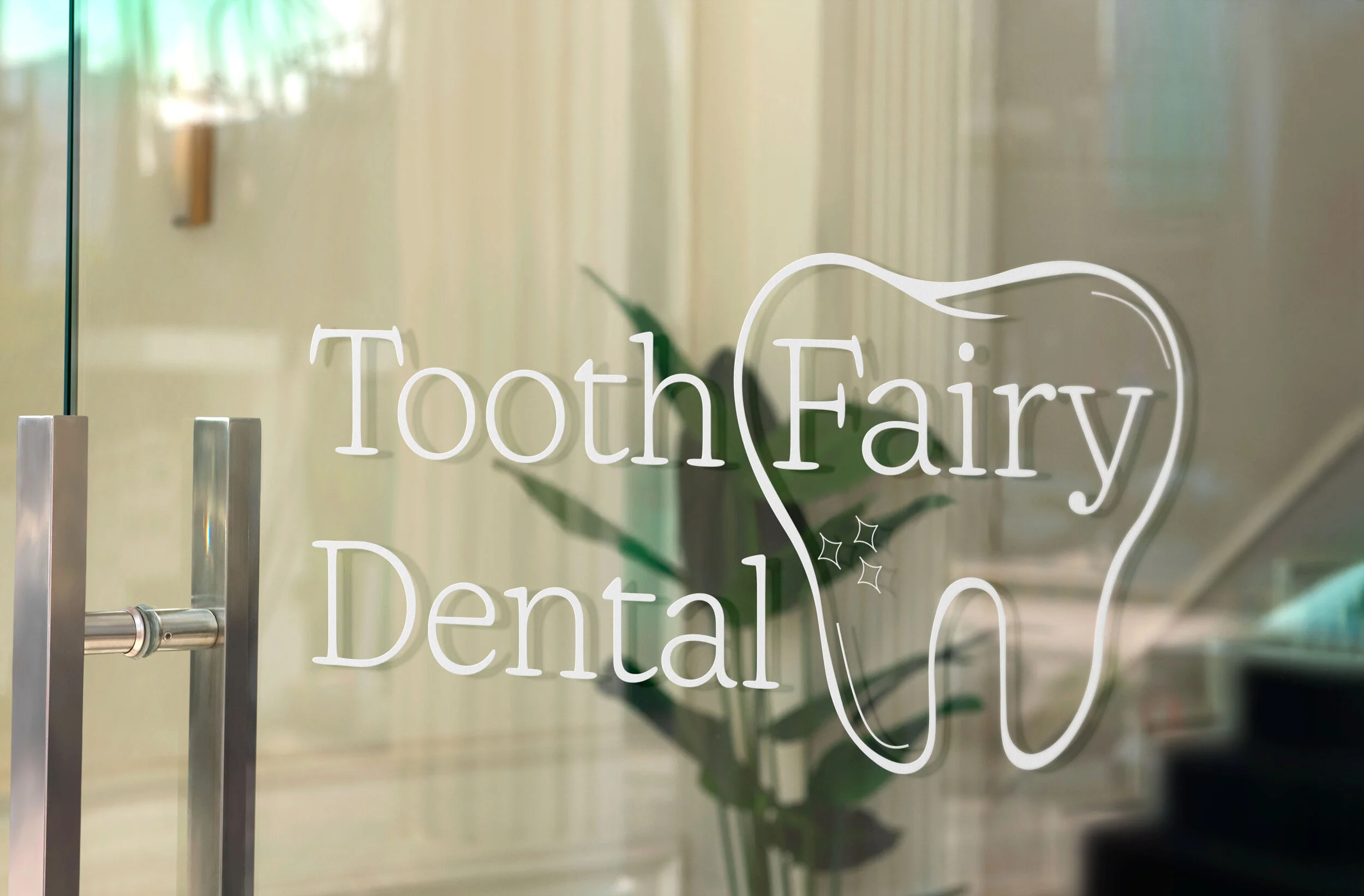 Glass Door Logo Mockup
“Tooth Fairy Dental logo displayed on a glass door, showcasing a professional brand identity for a modern dental office.”