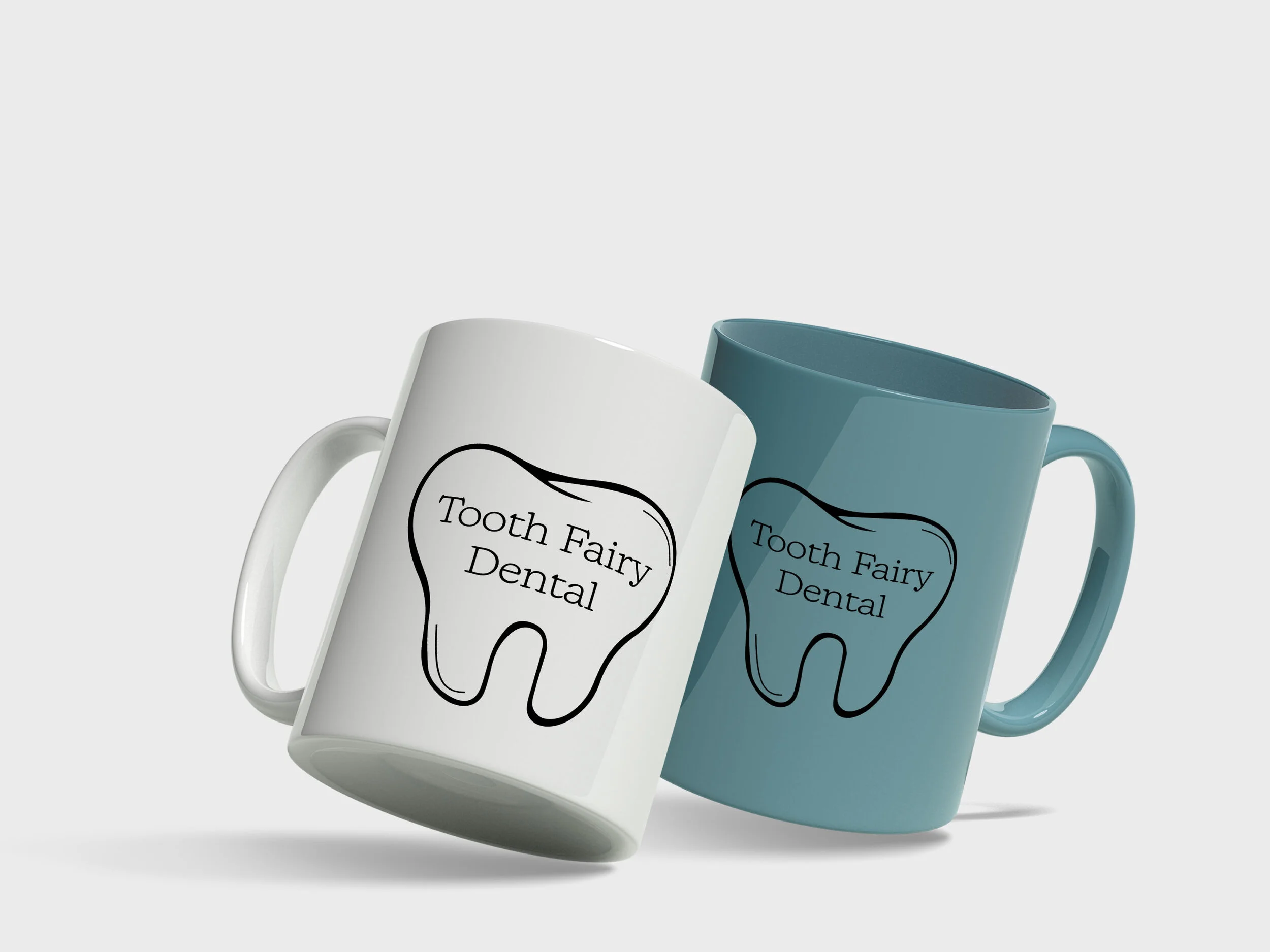 Mug Mockups
“Tooth Fairy Dental logo printed on white and teal ceramic mugs, demonstrating branded merchandise for client gifts and office use.”