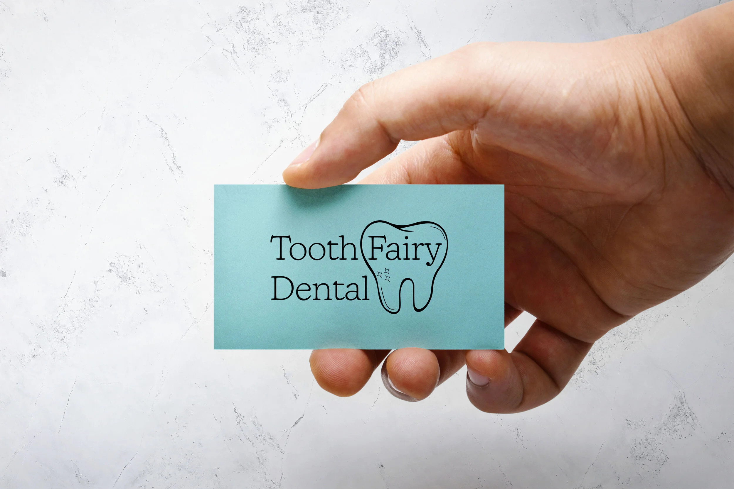Business Card Mockup
“Tooth Fairy Dental logo on a teal business card, highlighting a modern and approachable dental practice identity.”