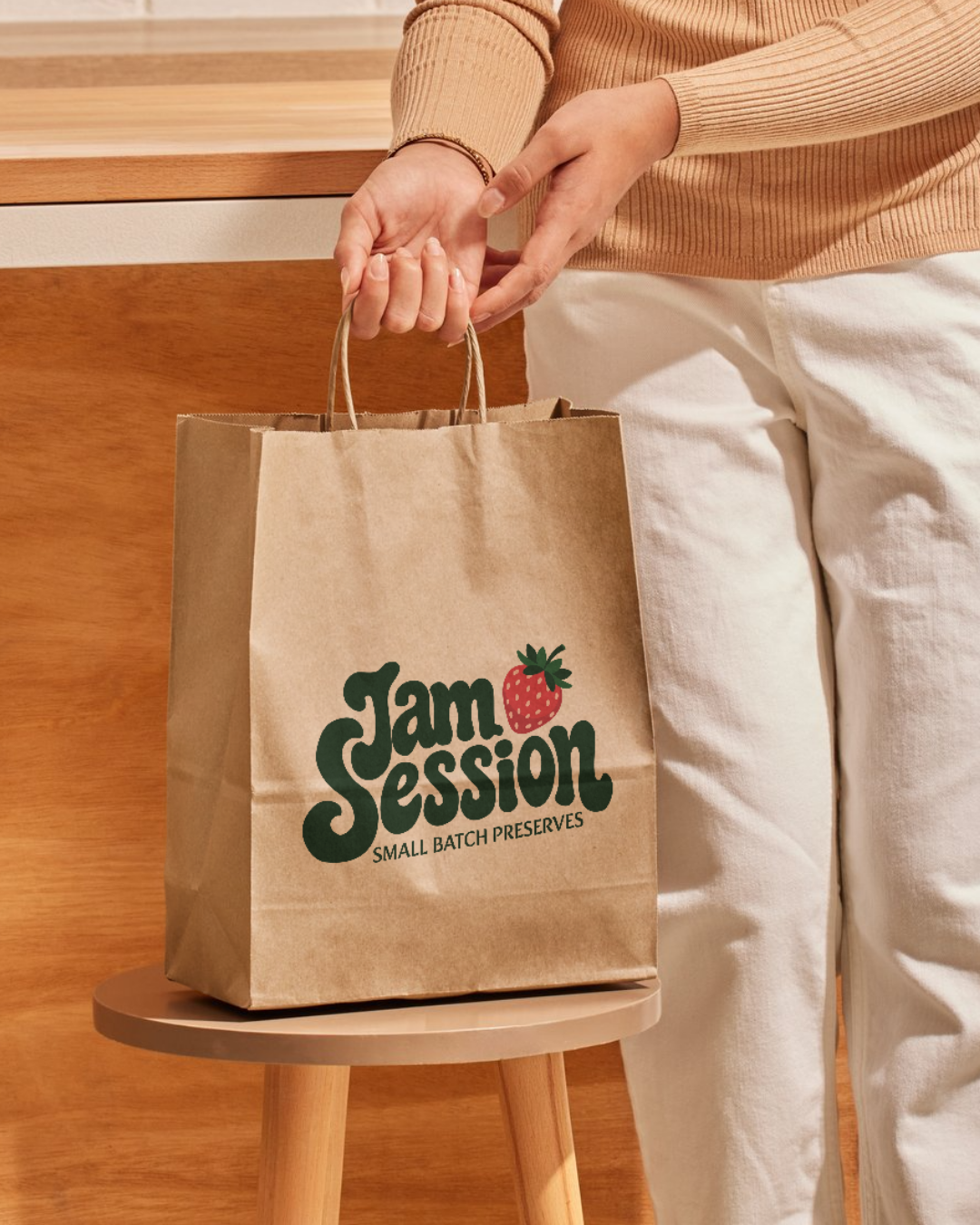 Illustrated Jam Session branding applied to a kraft retail bag for a small-batch preserves brand concept.