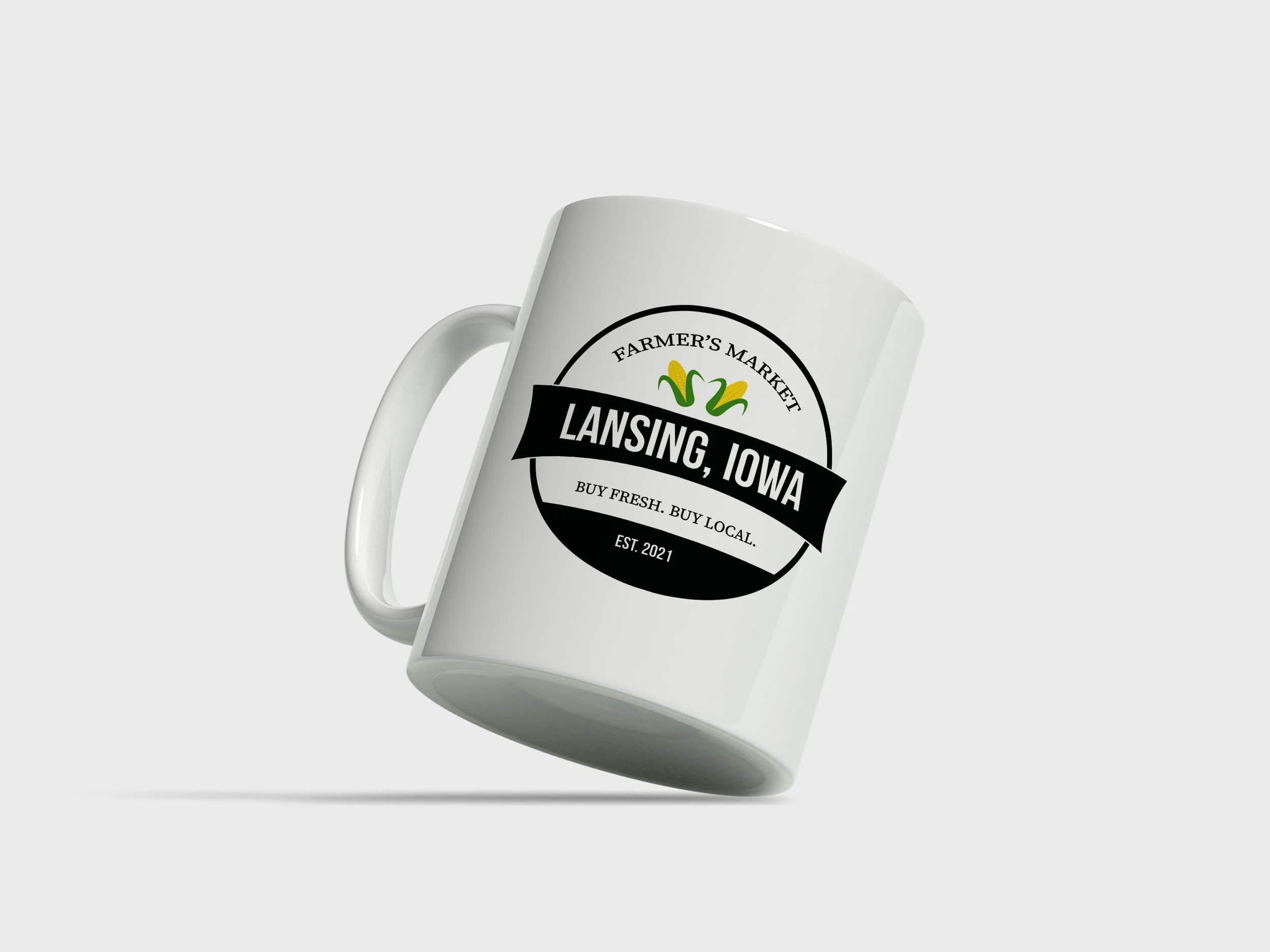 Lansing Iowa Farmers Market logo design featuring a fresh and community-inspired style, created to represent local growers and small-town charm.