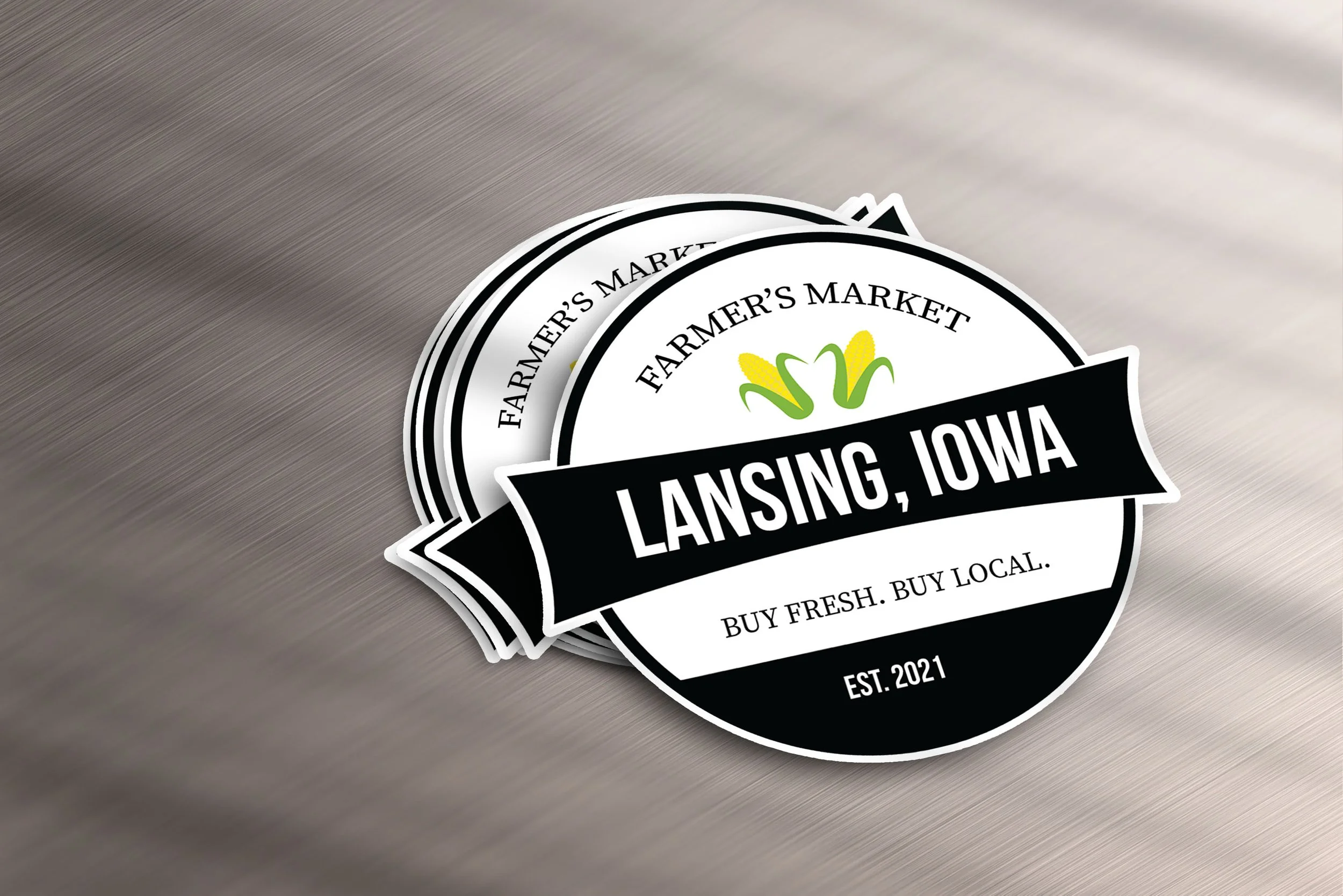 Lansing Iowa Farmers Market logo design featuring a fresh and community-inspired style, created to represent local growers and small-town charm.