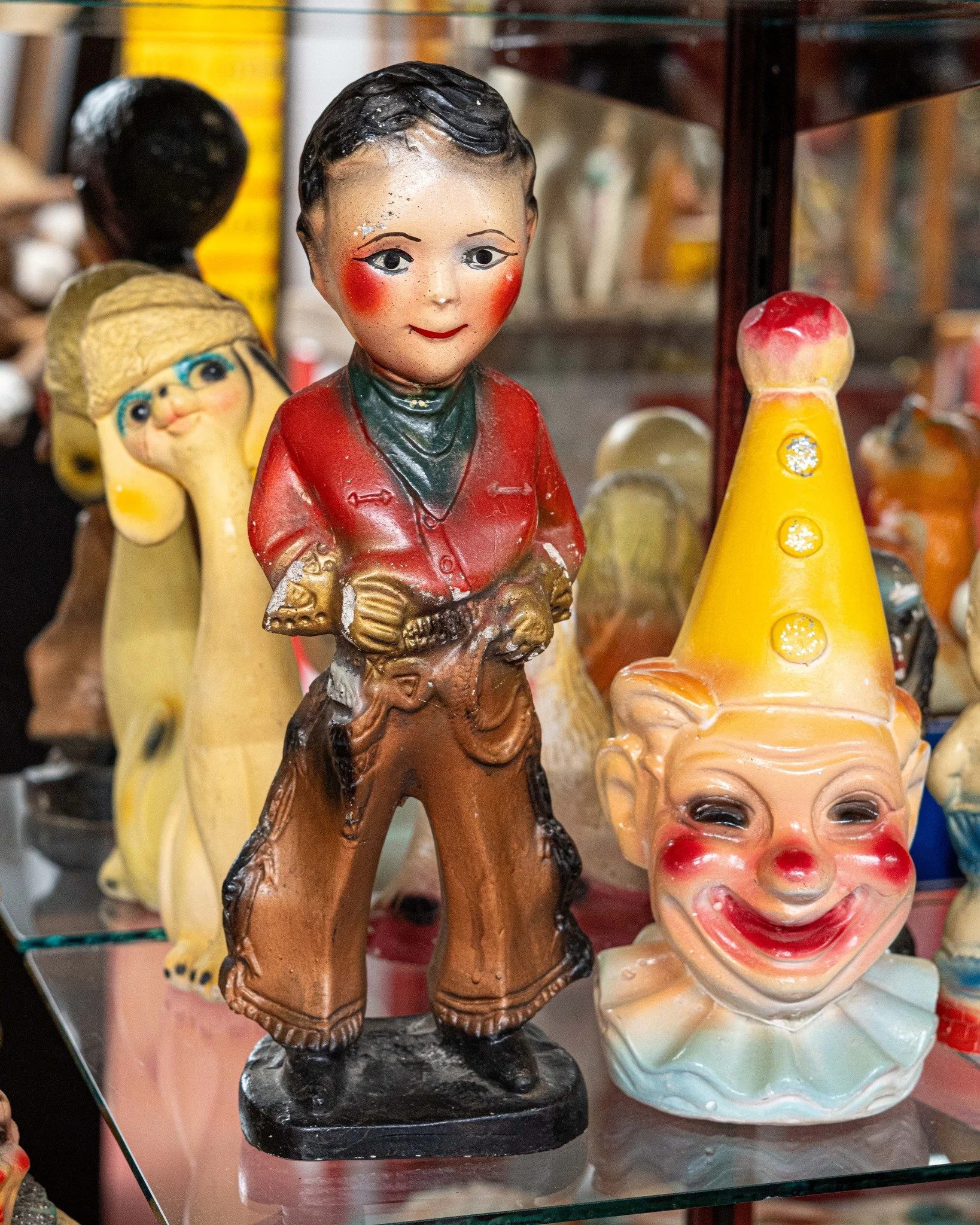 Carnival chalkware figures were popular carnival prizes in the late 19th century and early 20th century. They are quite charming and come in a variety of forms, often taking the shape of humans or dogs. These are formed from a chalk-like plaster and 
