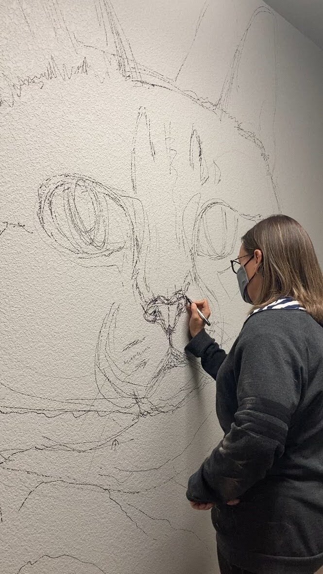 The projector would not work in the bathroom, so this large mural was done 100% free hand.