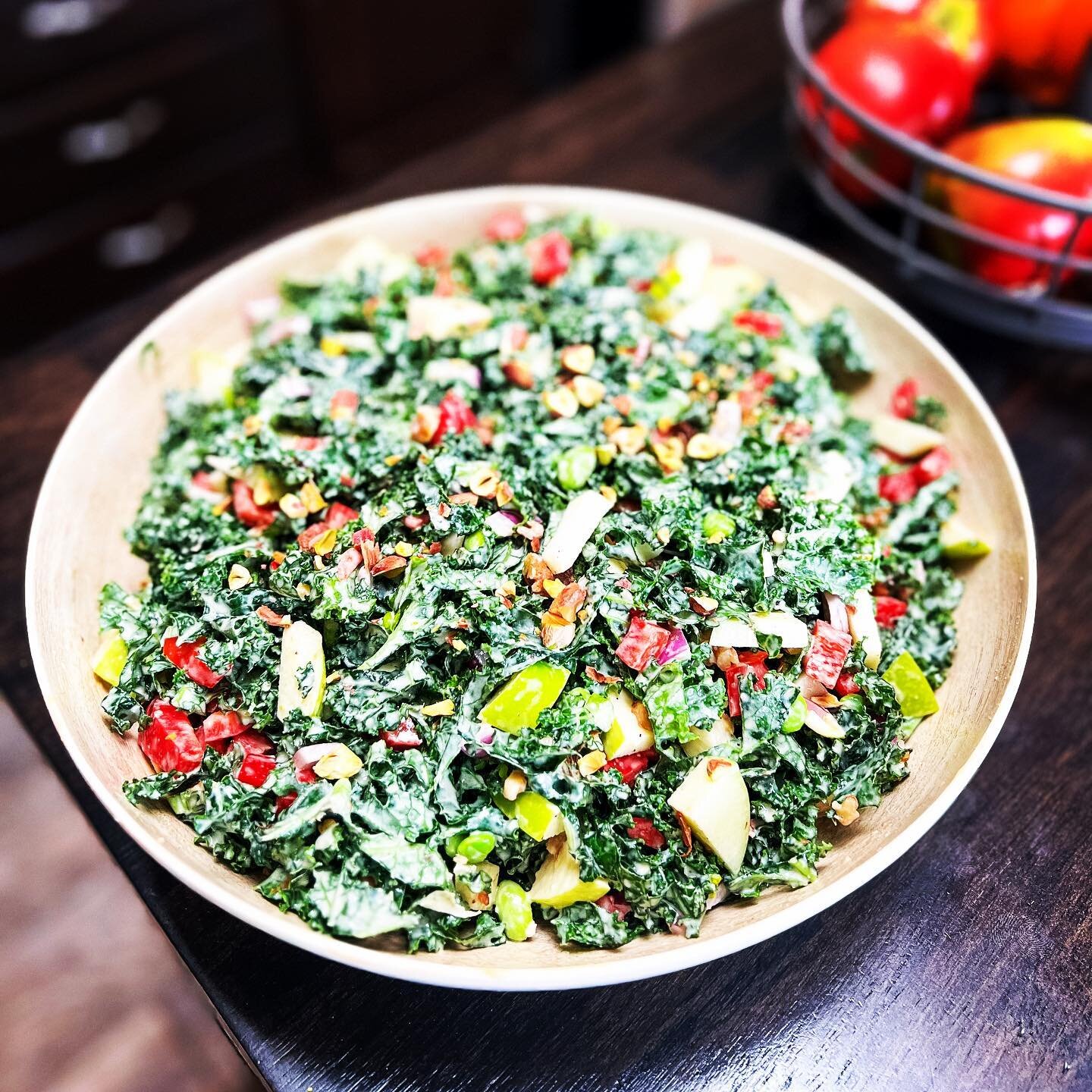 Kale salad with tahini dressing. 

I added apples, red onion, edamame, walnuts and pistachios for a delicious salad. Add a little chicken and you have a perfect lunch! 

#travelsthroughmykitchen #tahinidressing #kalesalad #grannysmith #nuts #peppers 