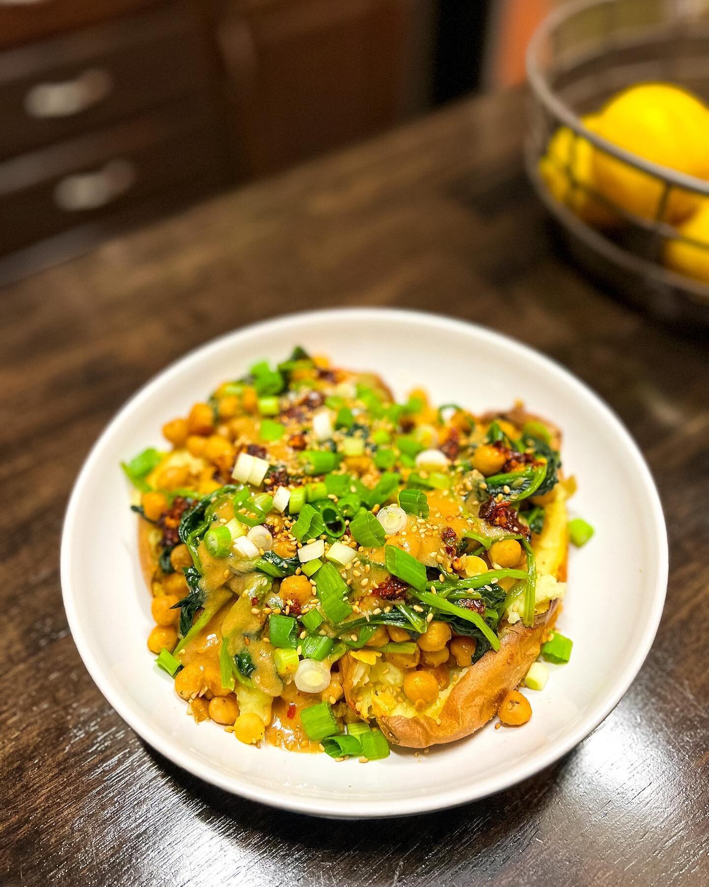 Sweet potatoes with tahini butter chickpeas. 

I saw this recipe online and just had to give it a go. It's such an interesting take on a meatless dinner.

The dressing has tahini, lemon juice and maple syrup, which is perfectly balanced with a genero