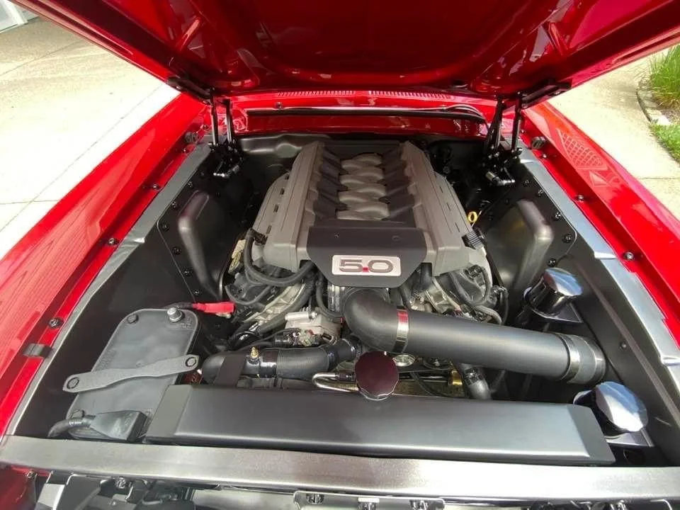 This 67 Convertible Coyote swap was one of our first runs at hiding that engine electrical harness and ecu