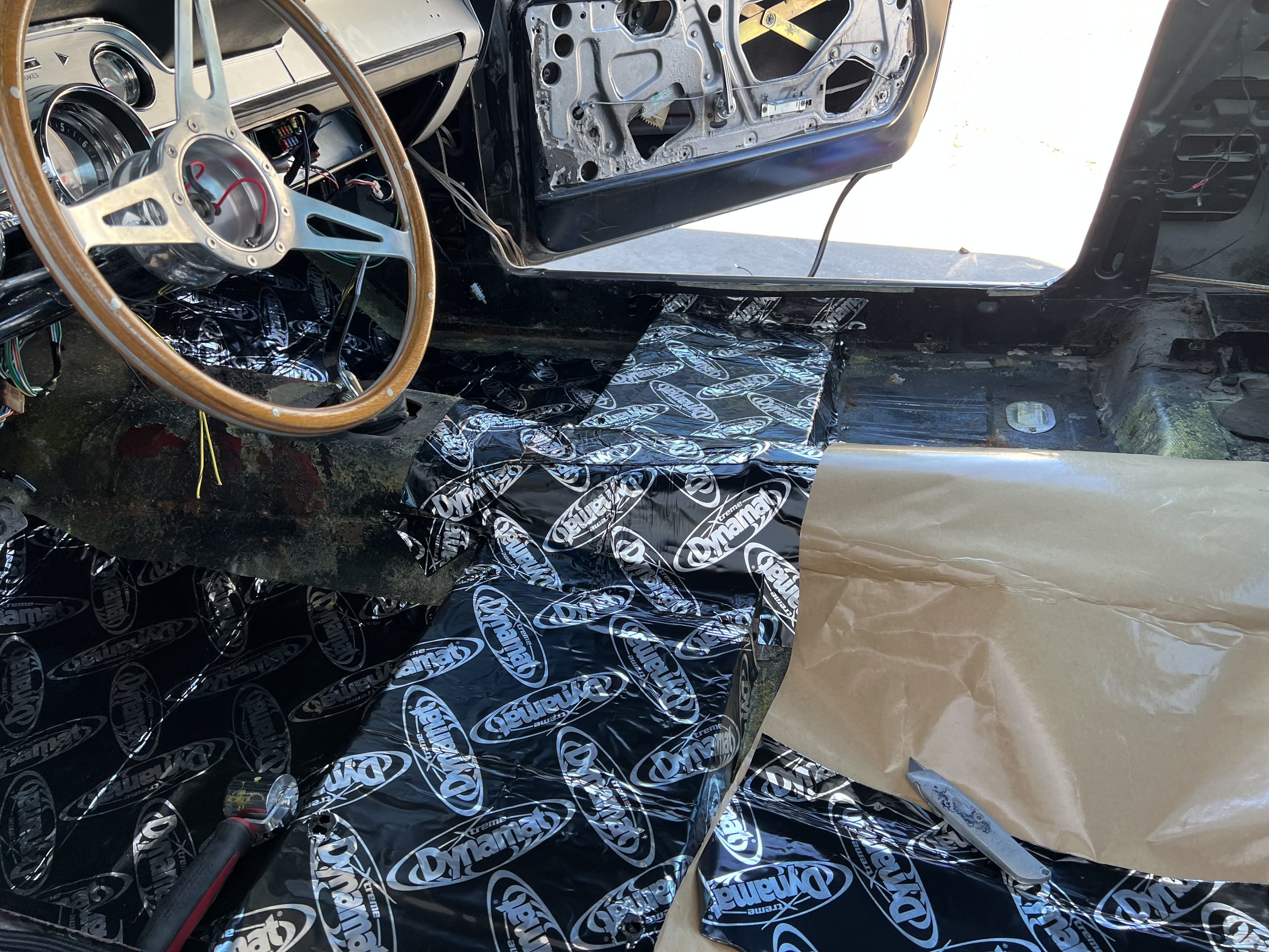Dynamat being installed